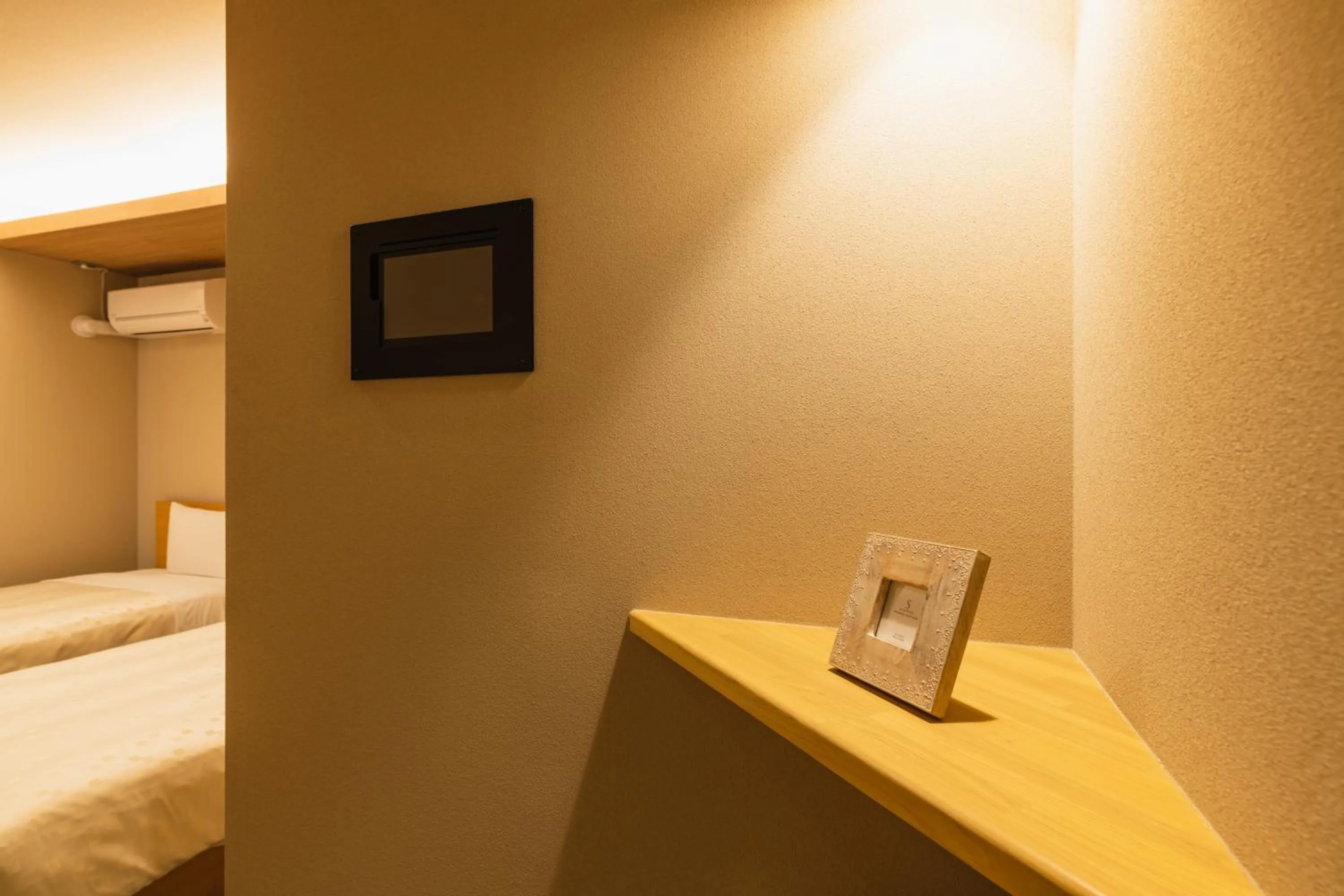 Photo of the whole room, Bed in GRAND BASE Fukuoka Tenjin