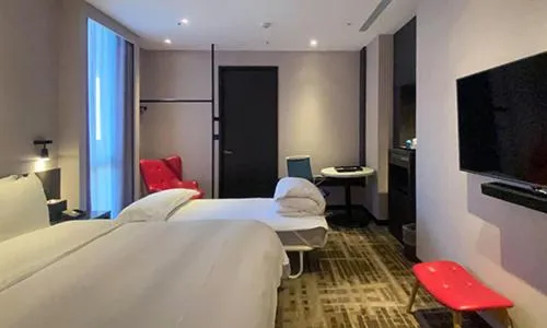 Bed in The Tango Hotel Taipei Shilin