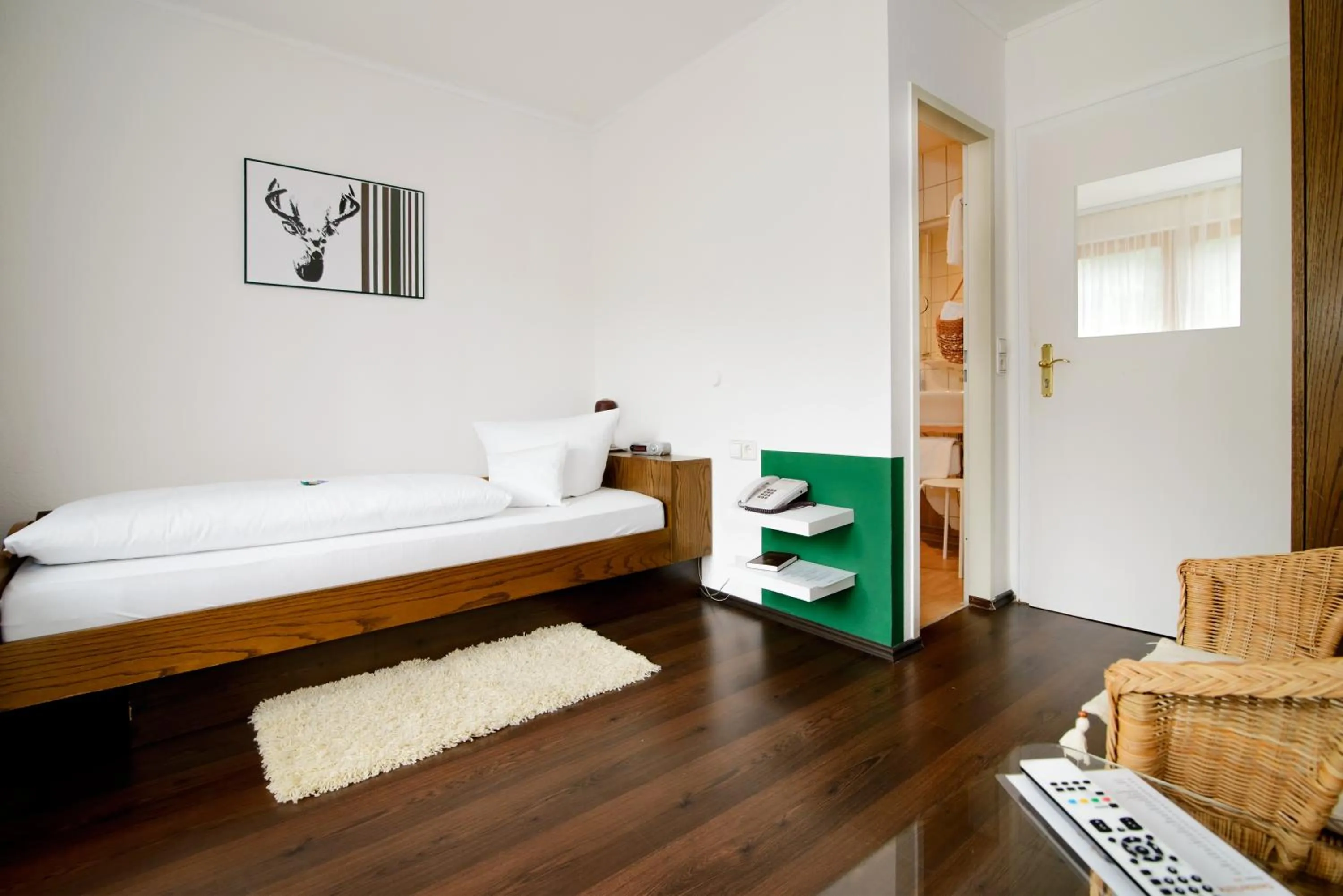 Photo of the whole room, Bed in Holzschuhs Schwarzwaldhotel