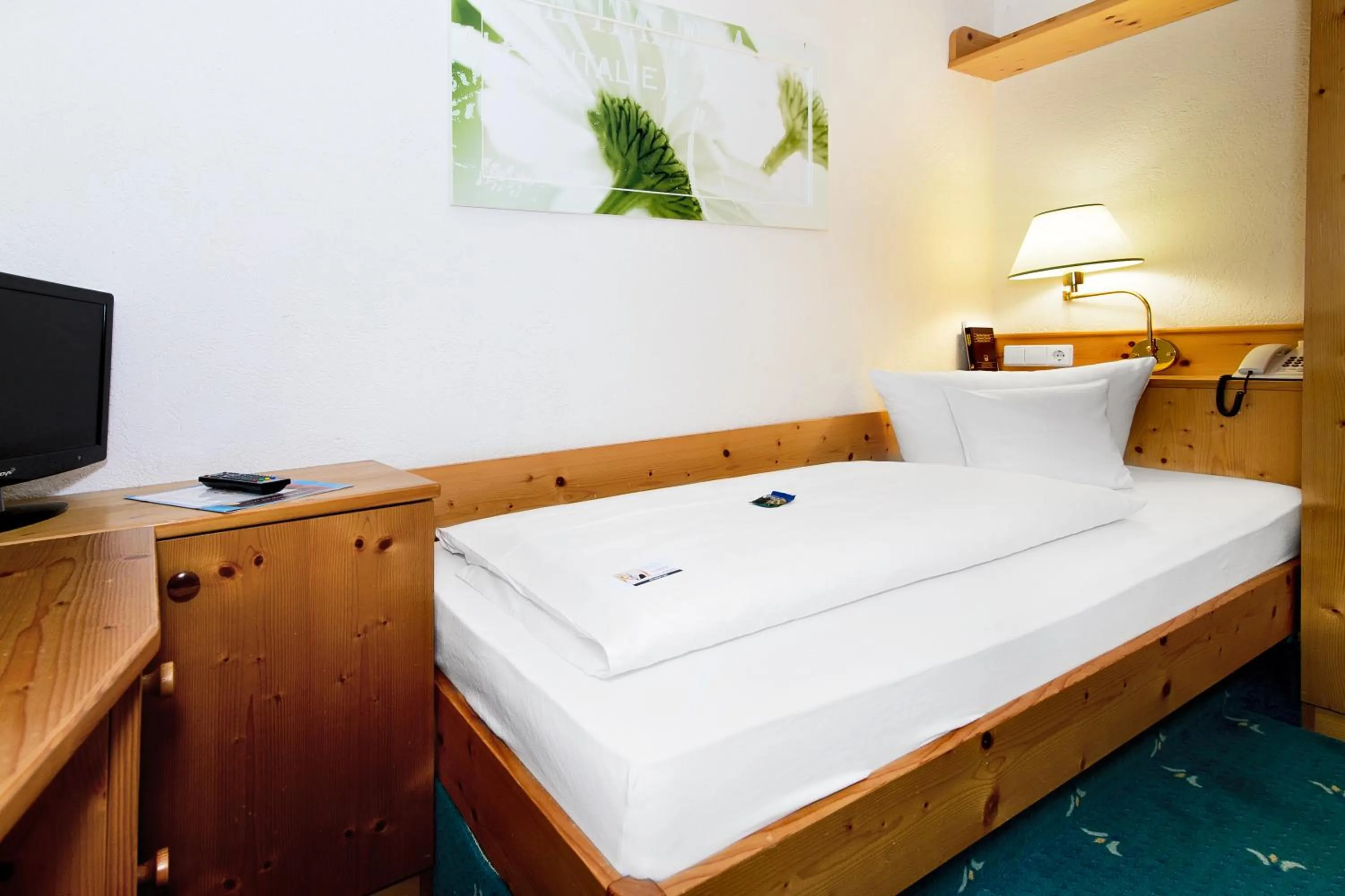 Bed in Holzschuhs Schwarzwaldhotel