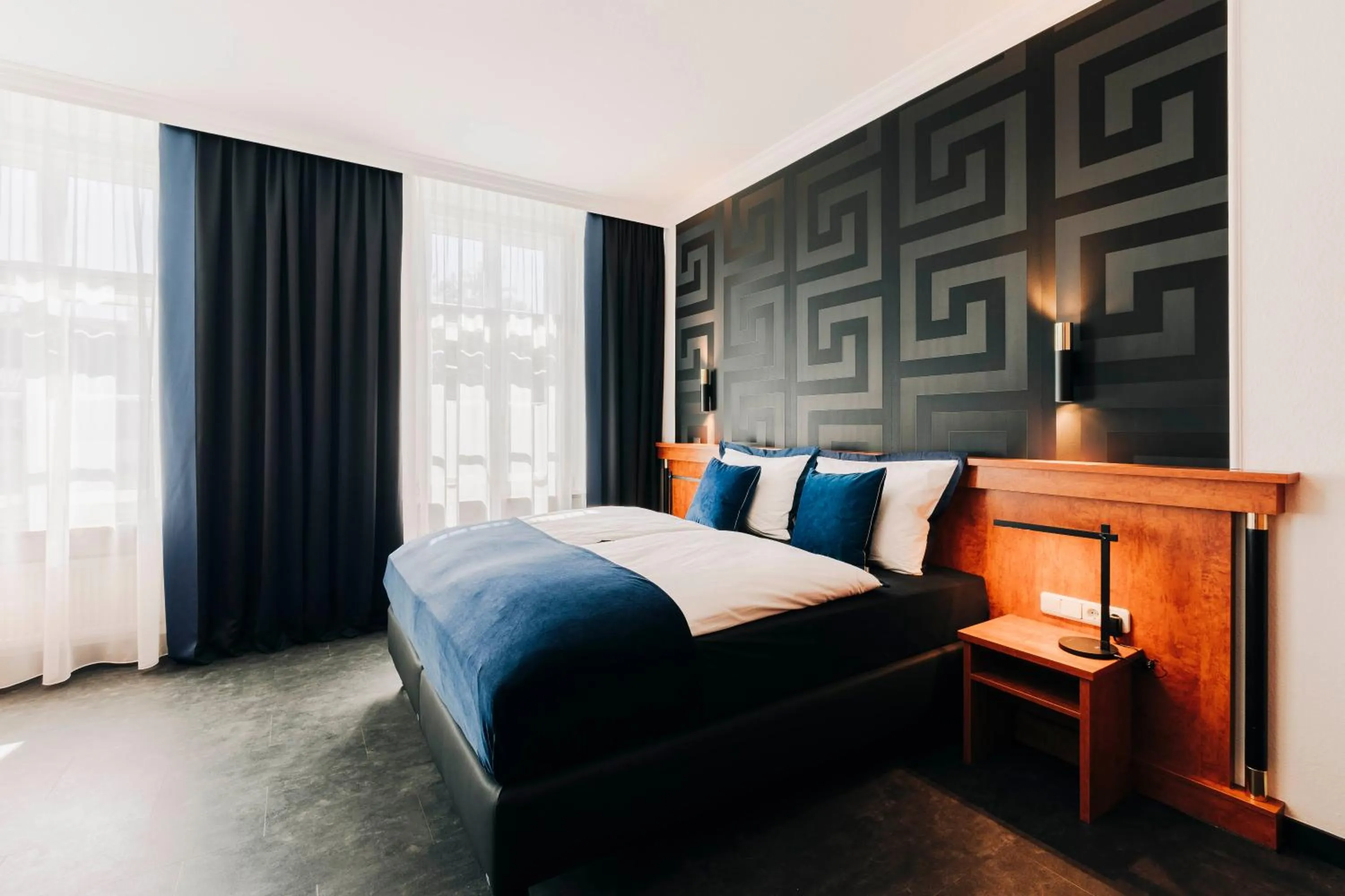 Photo of the whole room, Bed in DAS v EVERT Hotel - am Congress Centrum Würzburg