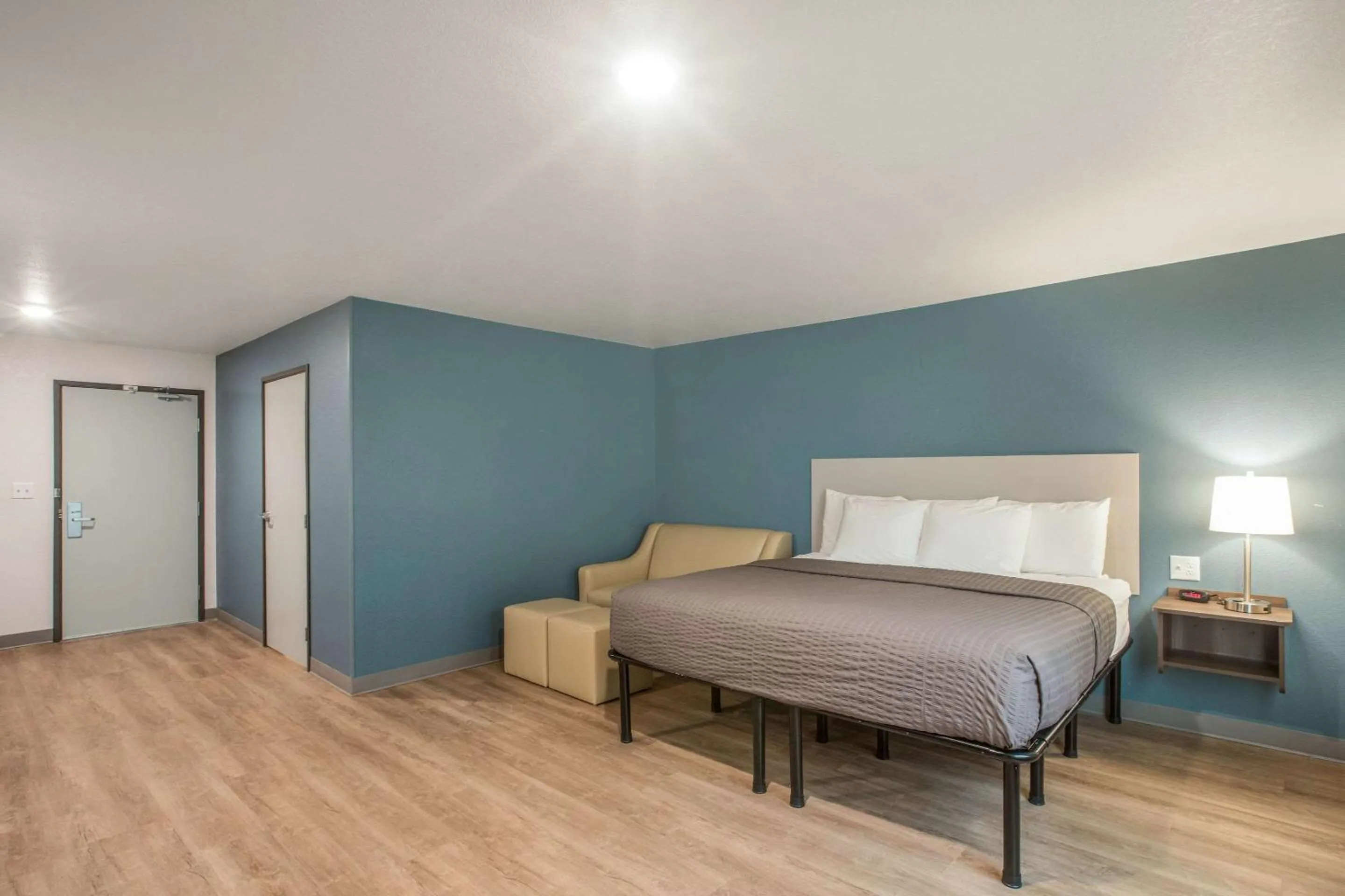 Photo of the whole room, Bed in WoodSpring Suites Atlanta McDonough