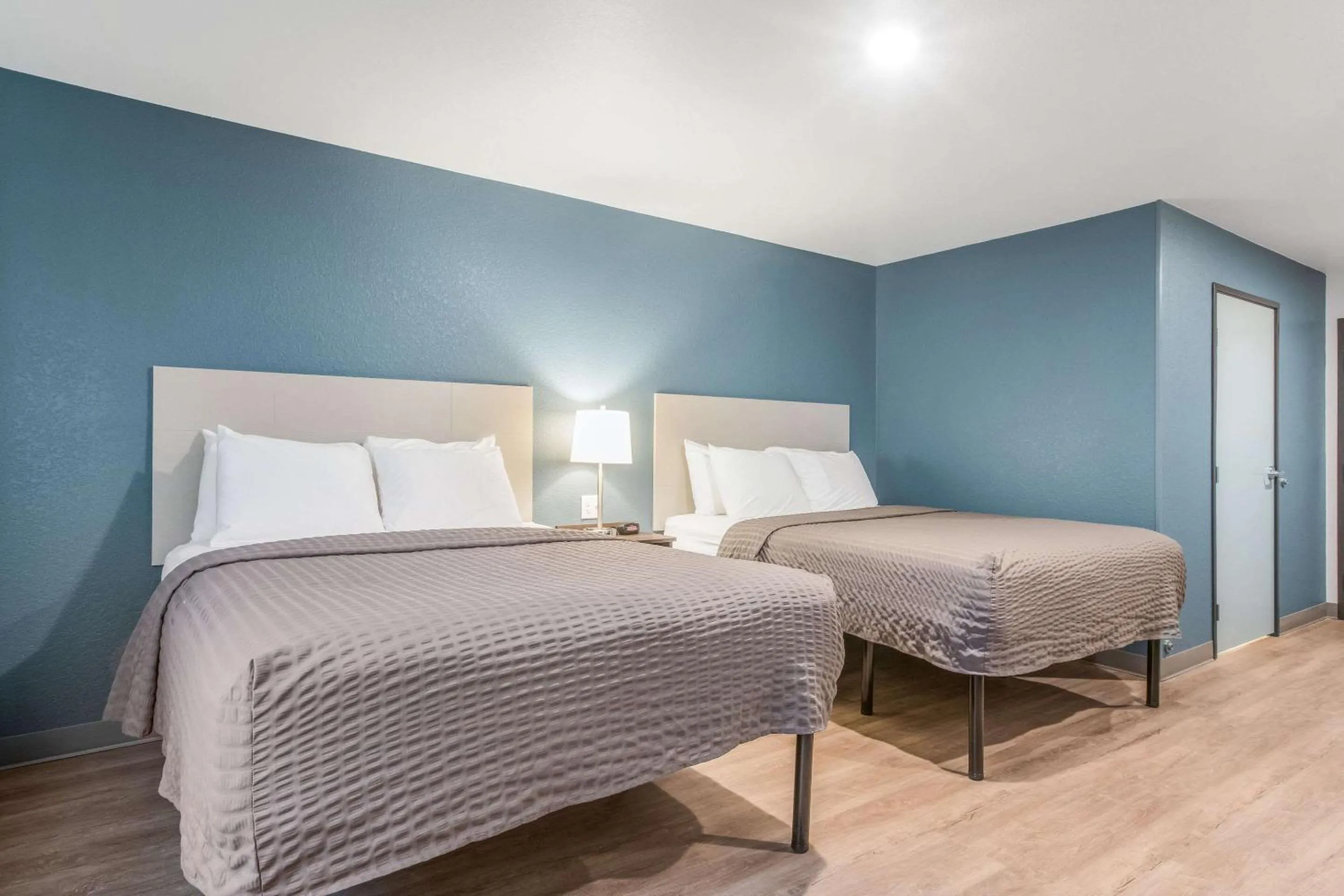 Photo of the whole room, Bed in WoodSpring Suites Atlanta McDonough