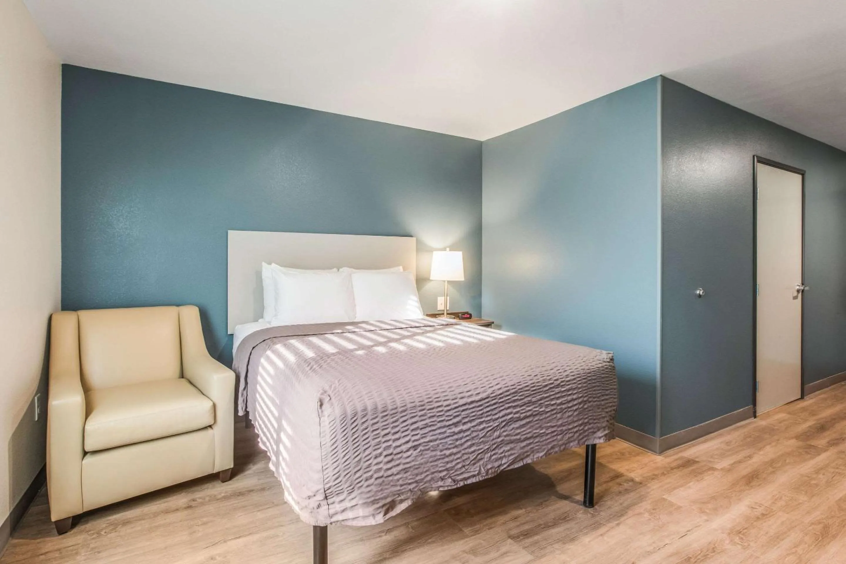 Photo of the whole room, Bed in WoodSpring Suites Atlanta McDonough