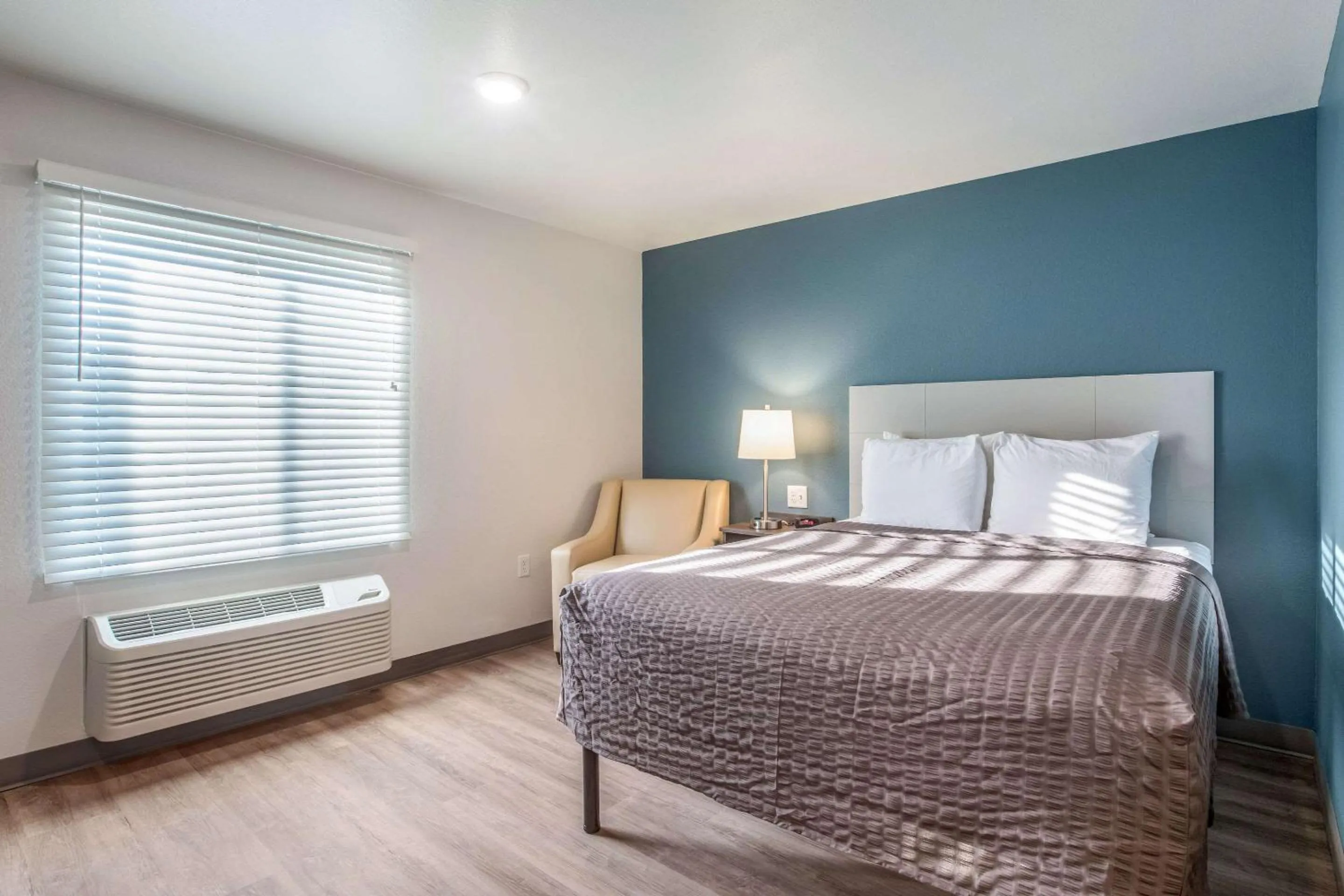 Photo of the whole room, Bed in WoodSpring Suites Atlanta McDonough