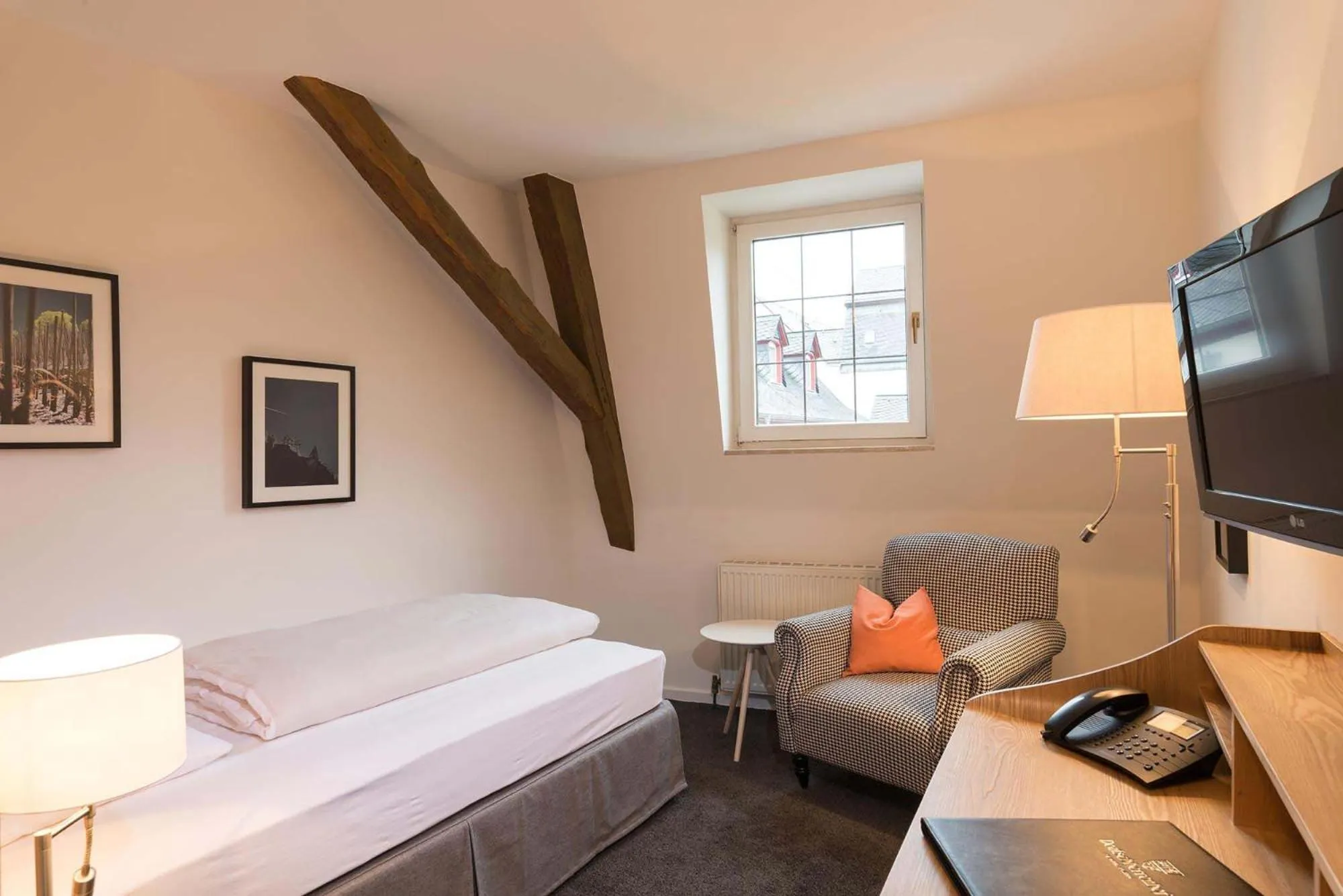 Photo of the whole room, Bed in Hotel Deutschherrenhof