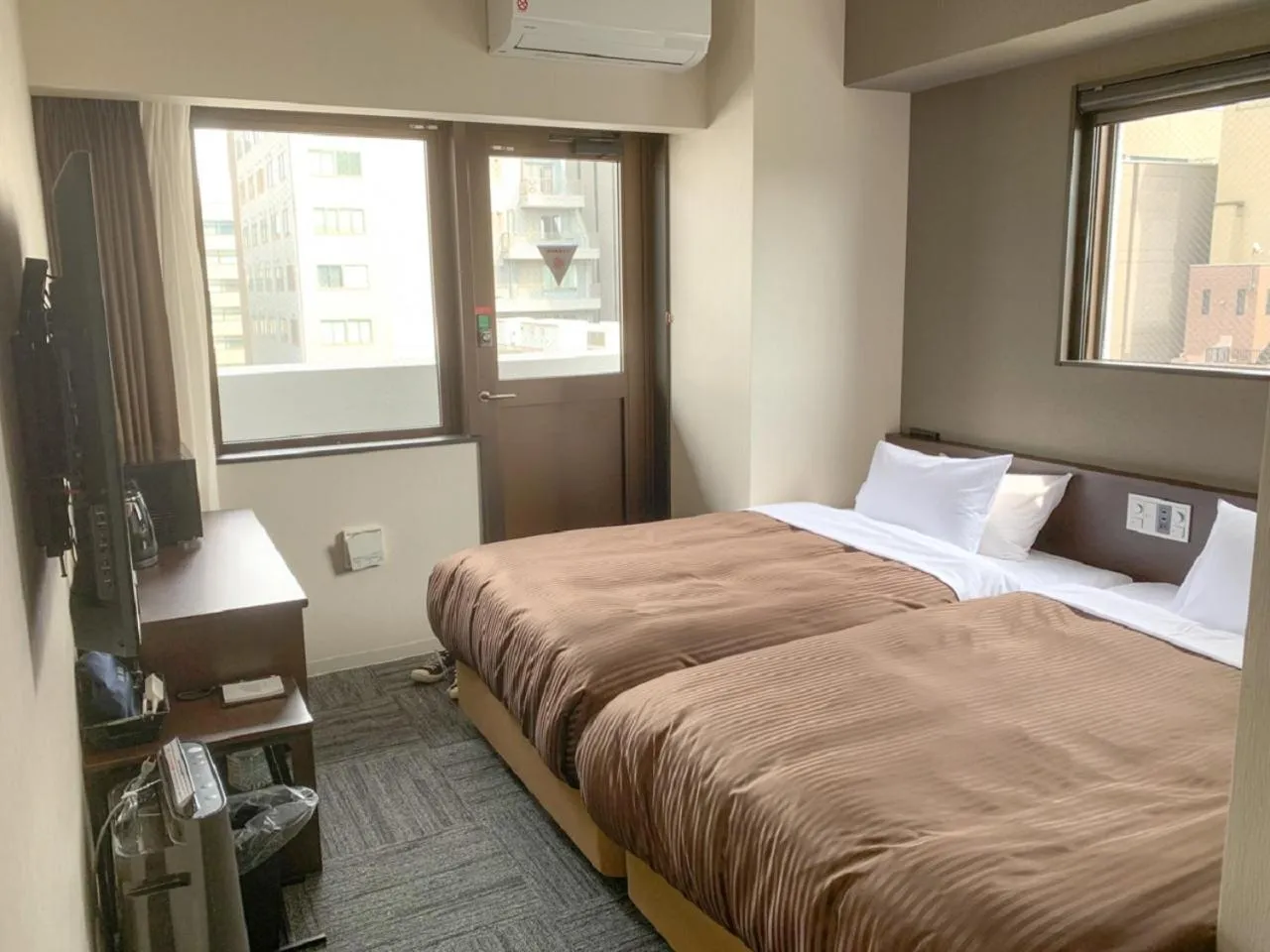 Bed in HOTEL LiVEMAX Hiroshima Peace Park Mae
