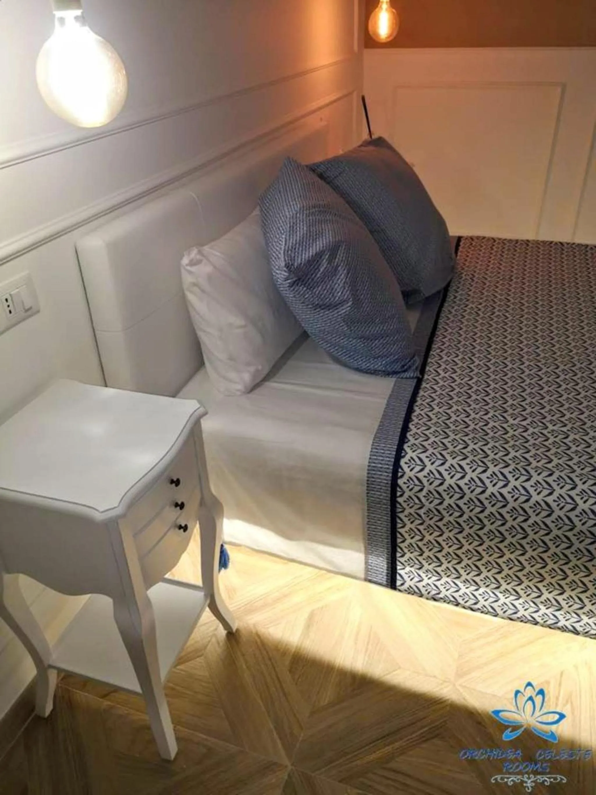 Bed in B&B Orchidea Celeste