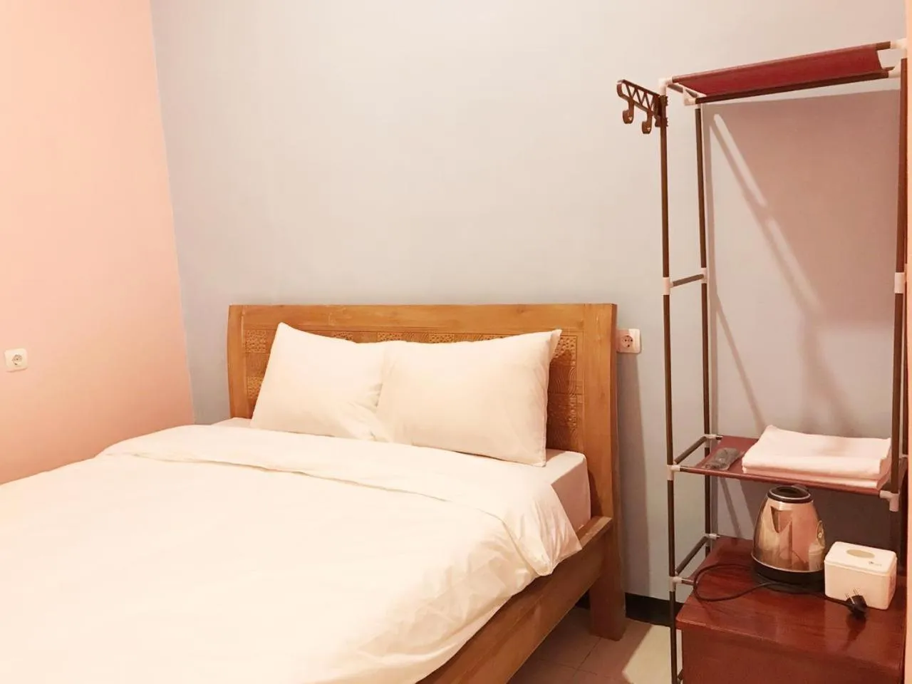 Bed in RoomZ Budget Residence