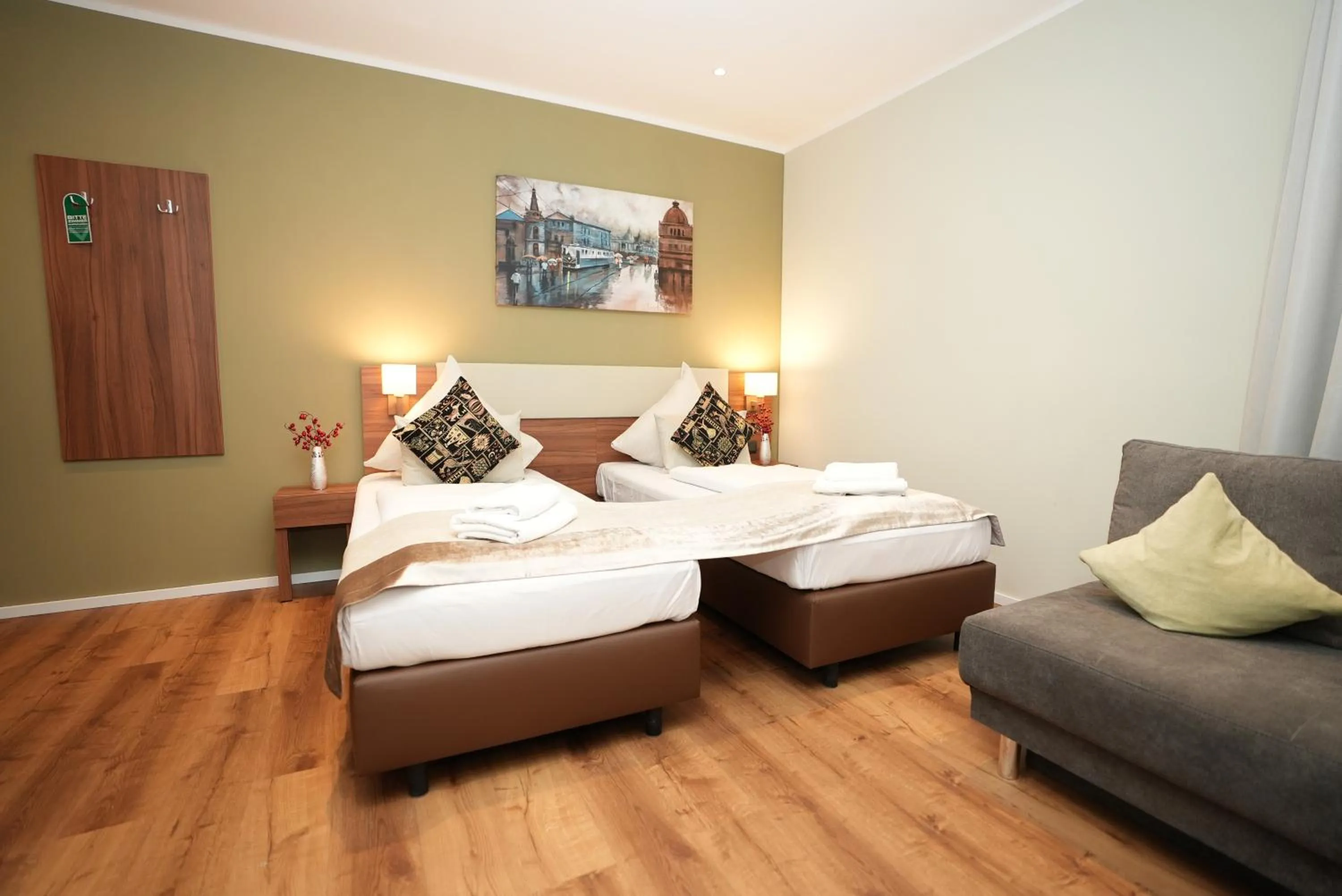 Bed in Hotel Attaché an der Messe