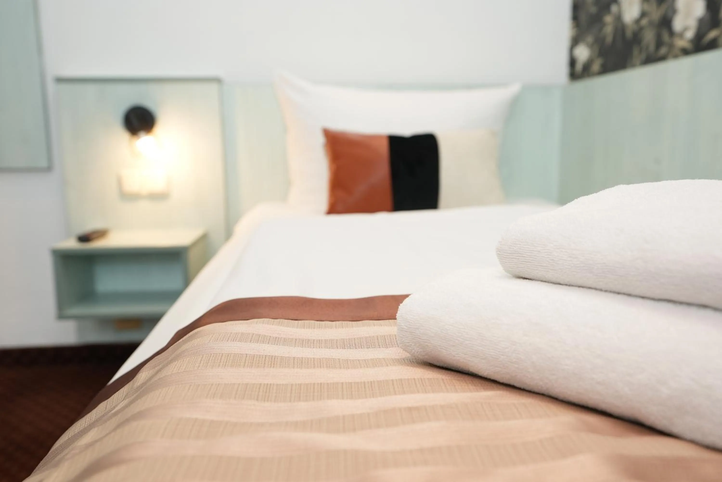 Bed in Hotel Attaché an der Messe