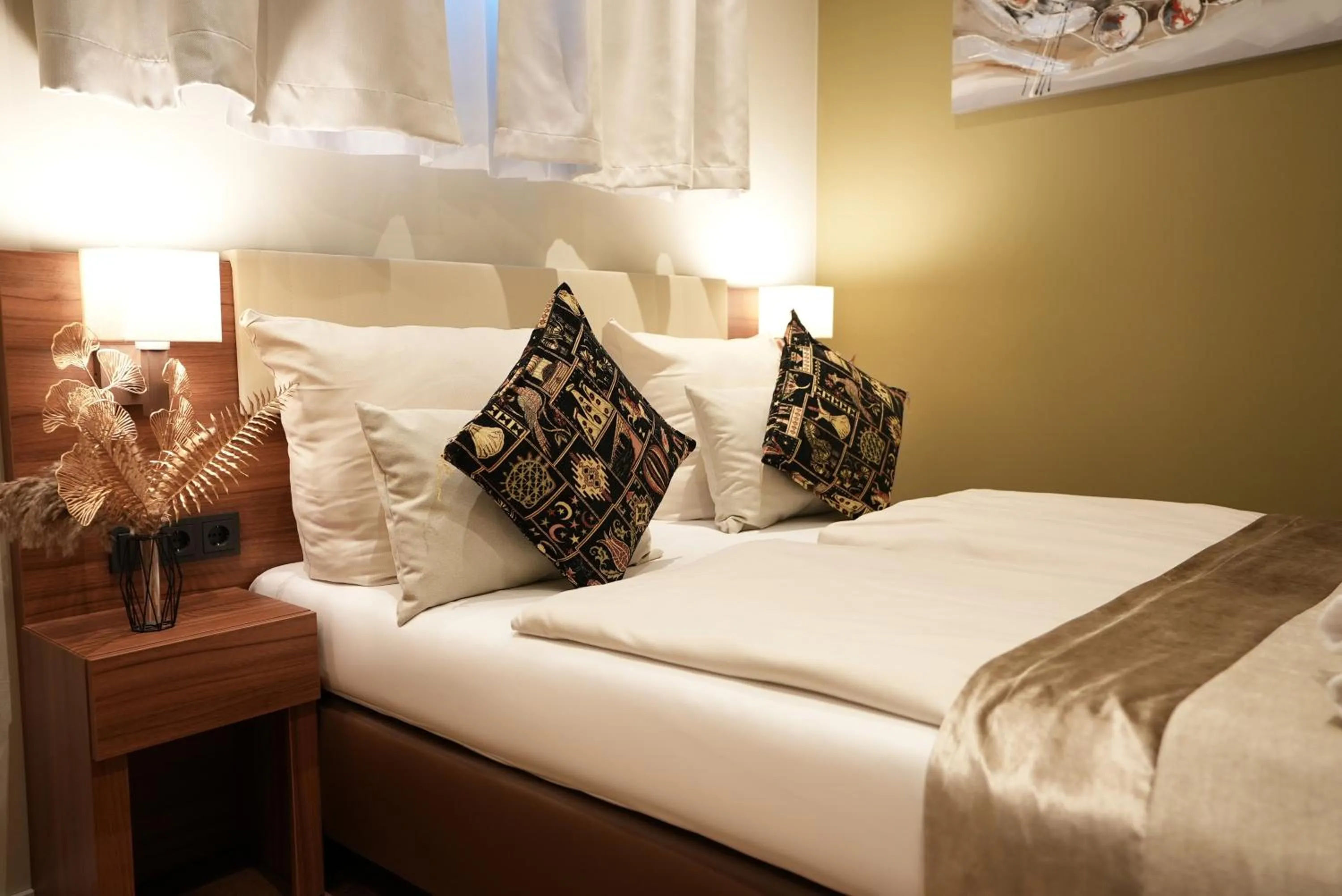 Bed in Hotel Attaché an der Messe