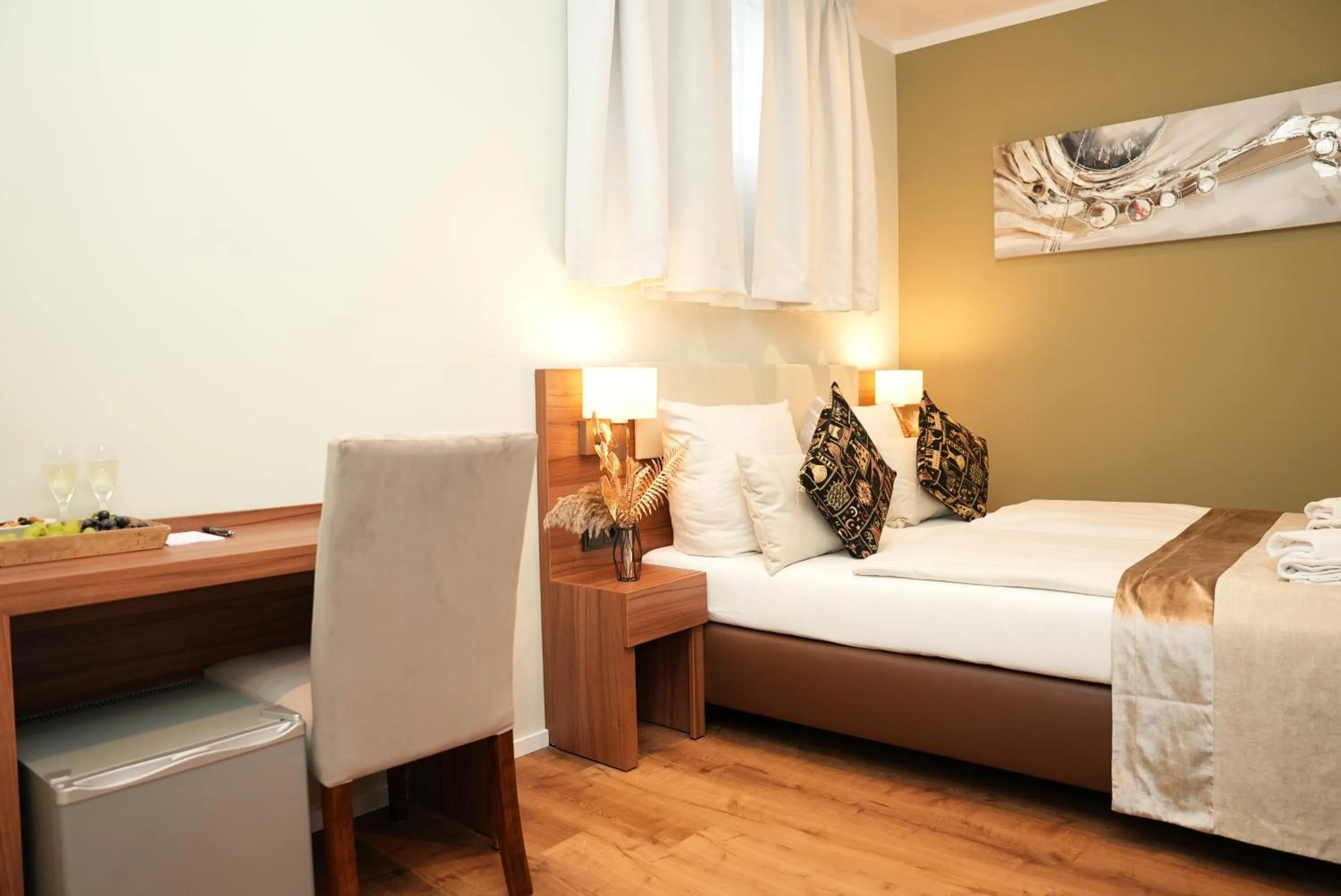 Bed in Hotel Attaché an der Messe