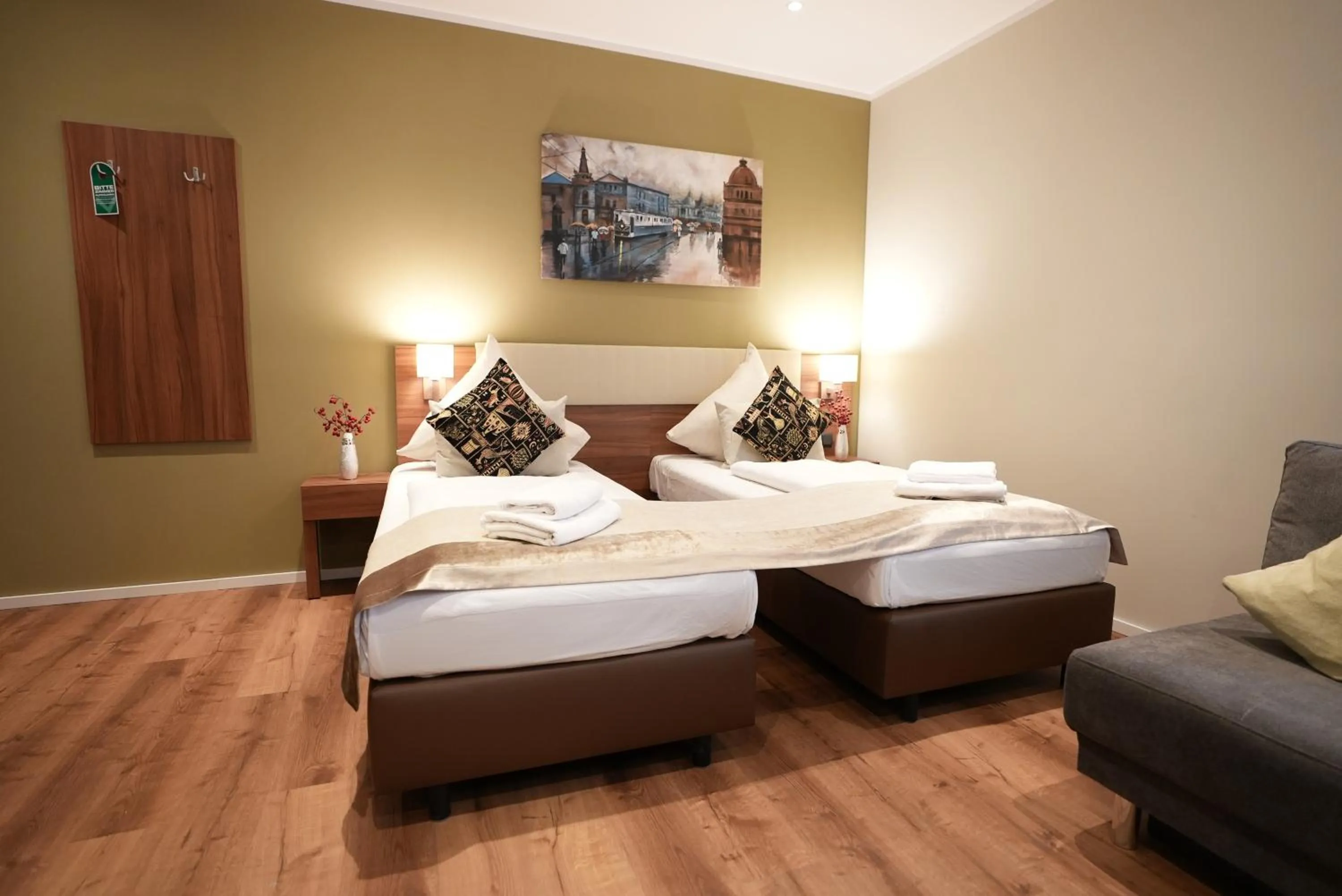 Bed in Hotel Attaché an der Messe