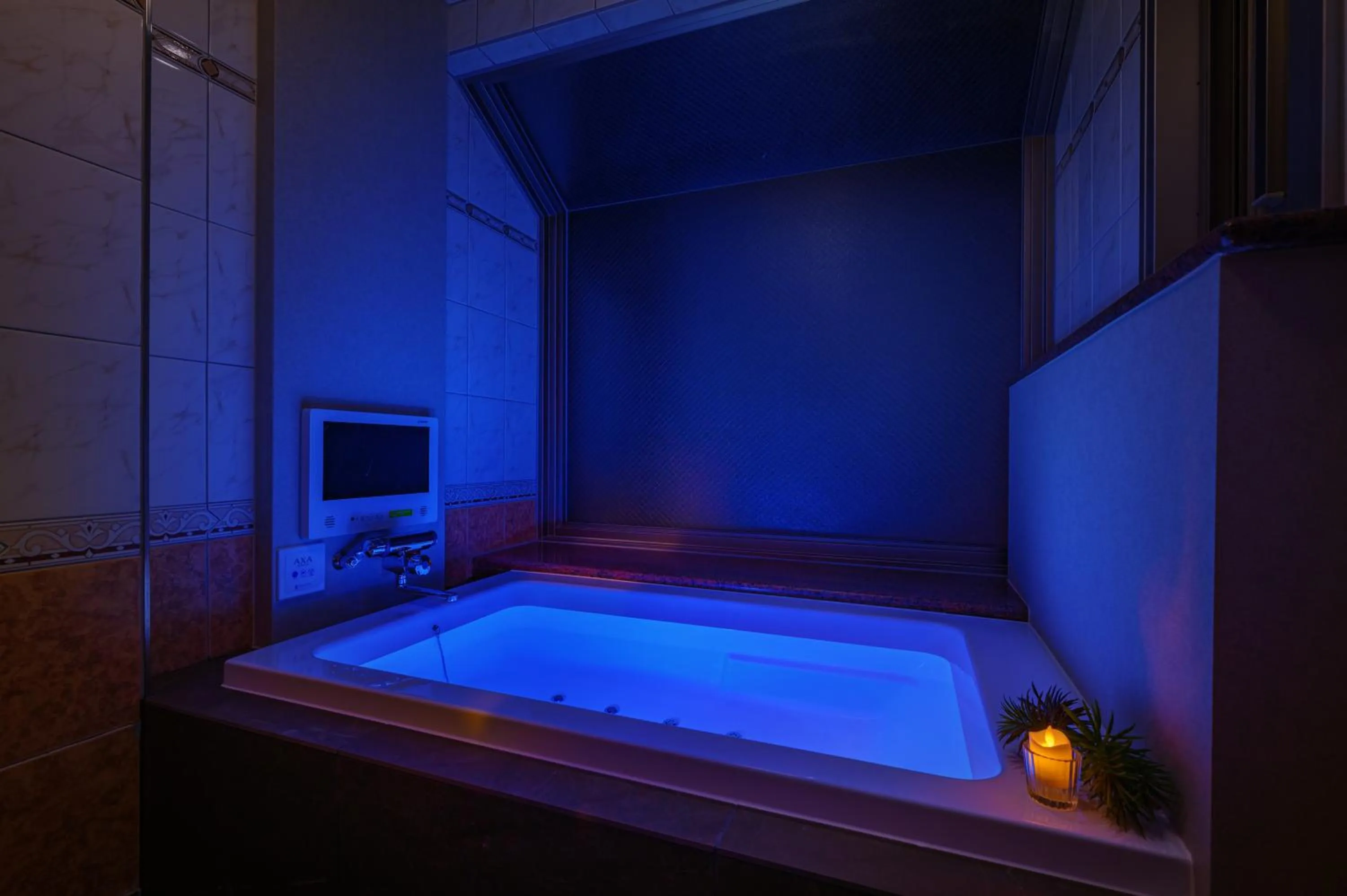 Bed in HOTEL C.KOHOKU