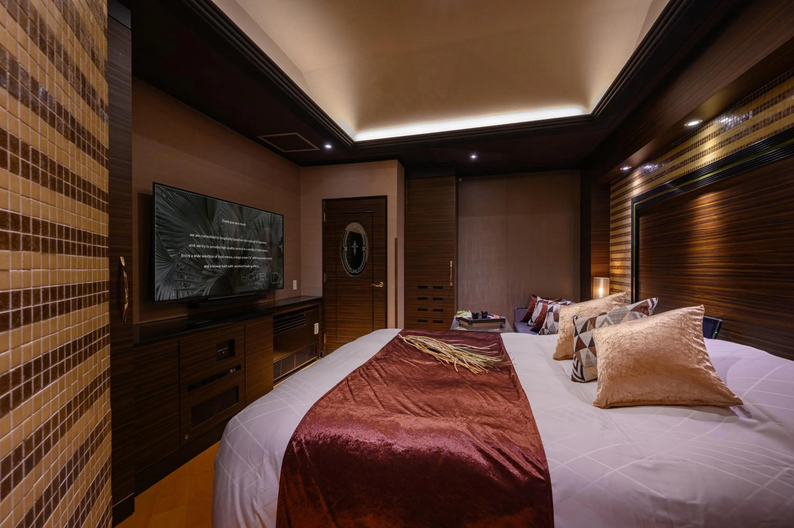 Bed in HOTEL C.KOHOKU