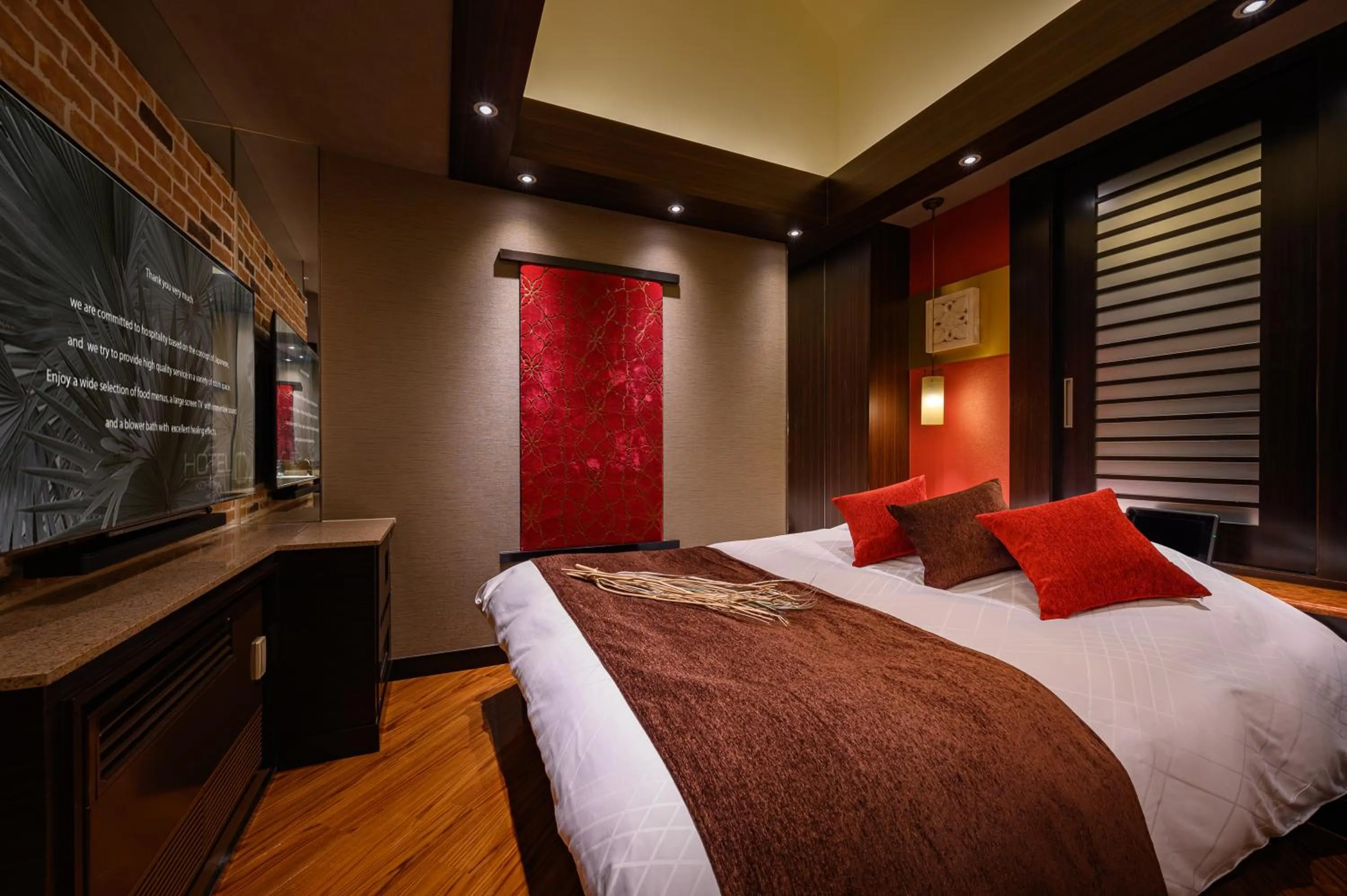 Bed in HOTEL C.KOHOKU