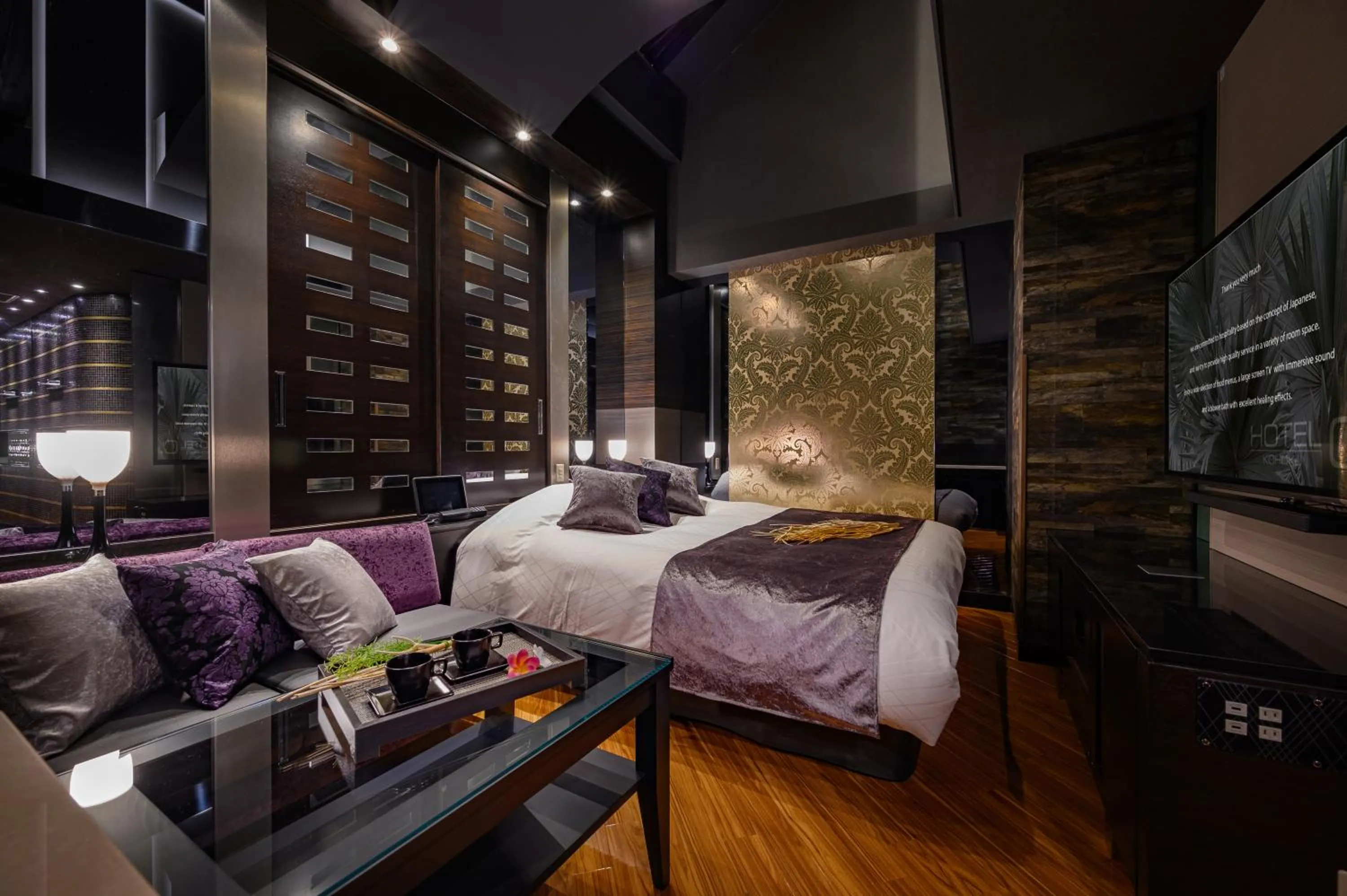 Bed in HOTEL C.KOHOKU