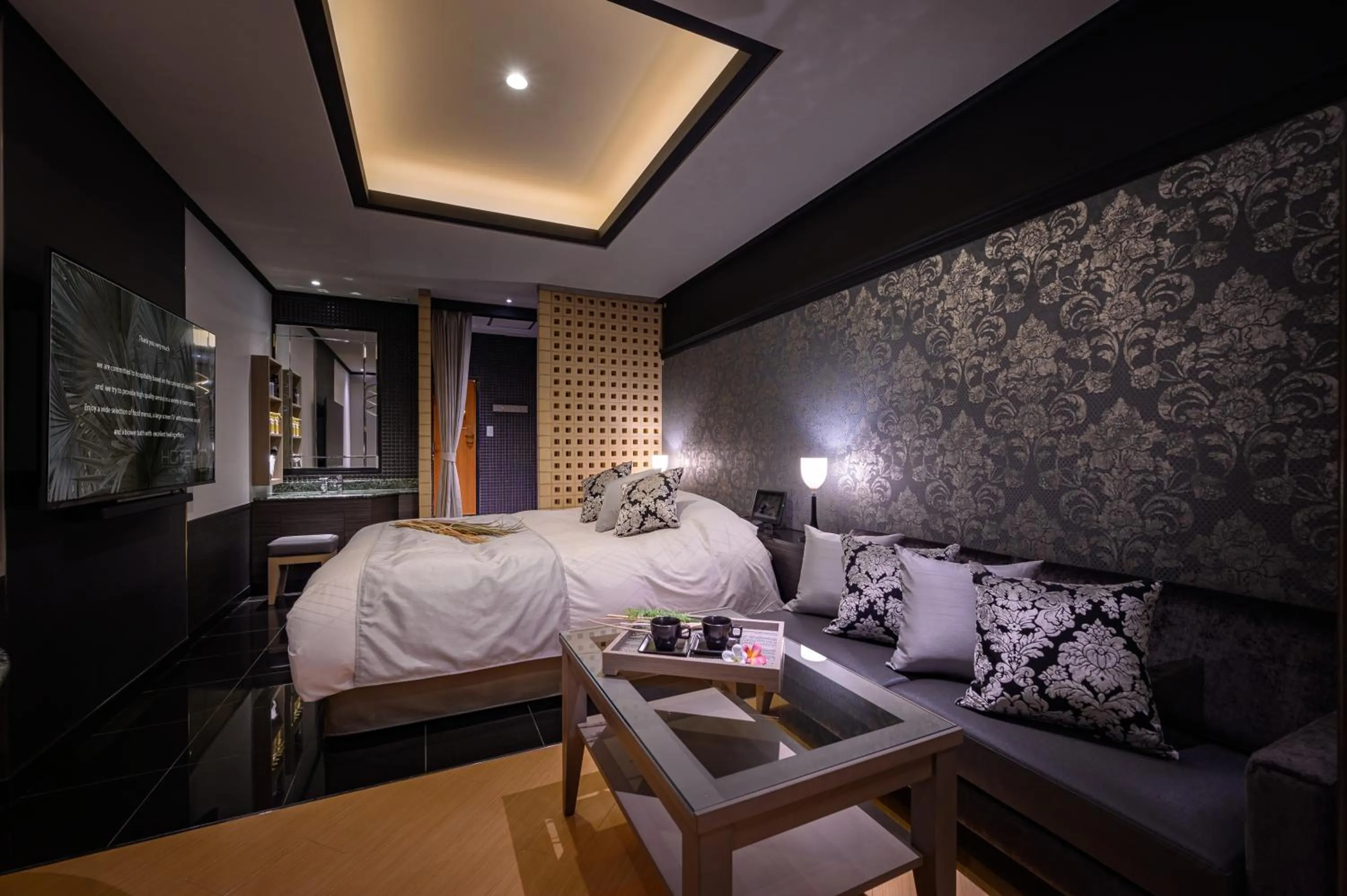 Bed in HOTEL C.KOHOKU