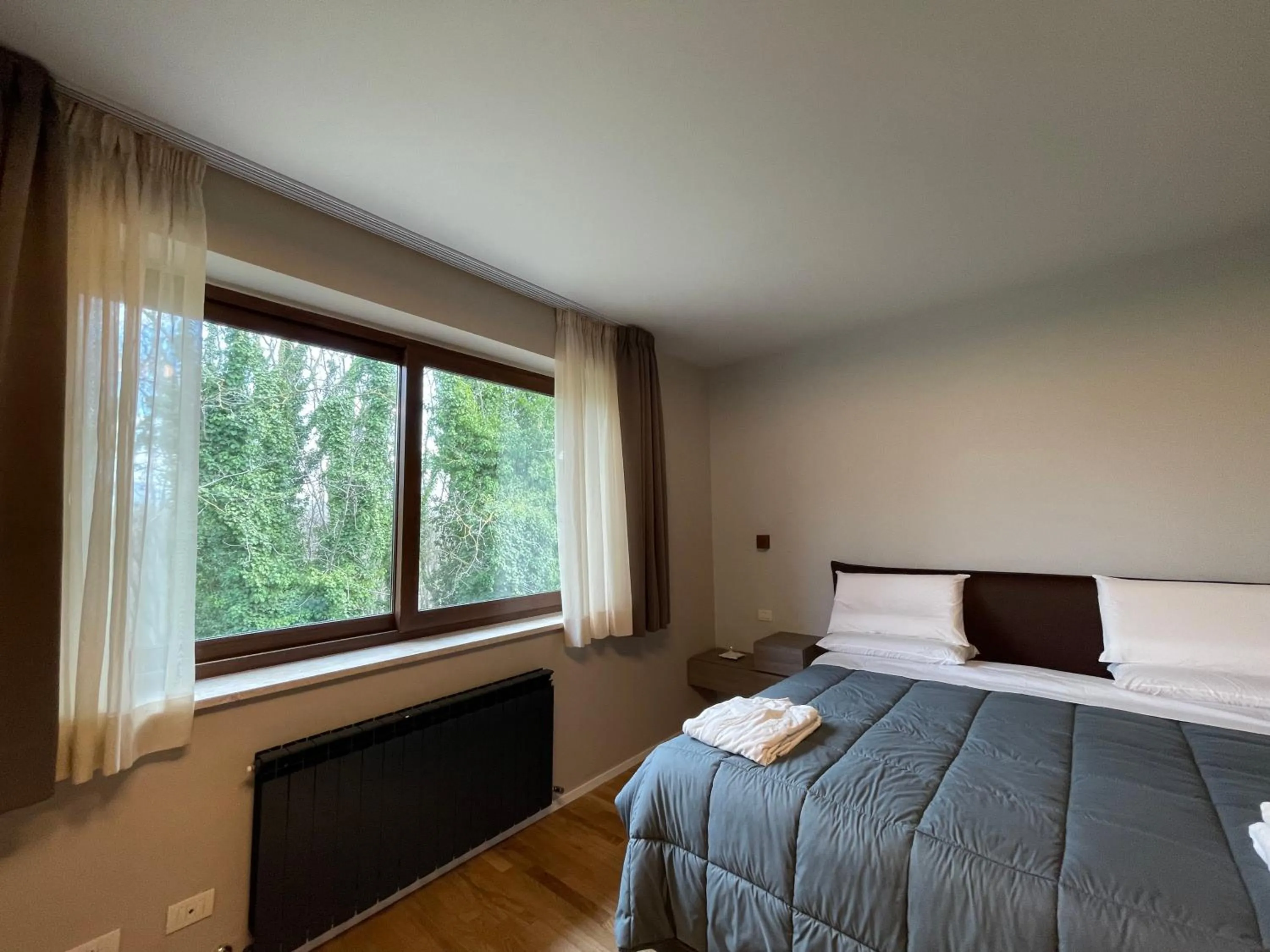 Bed in Aminta Resort