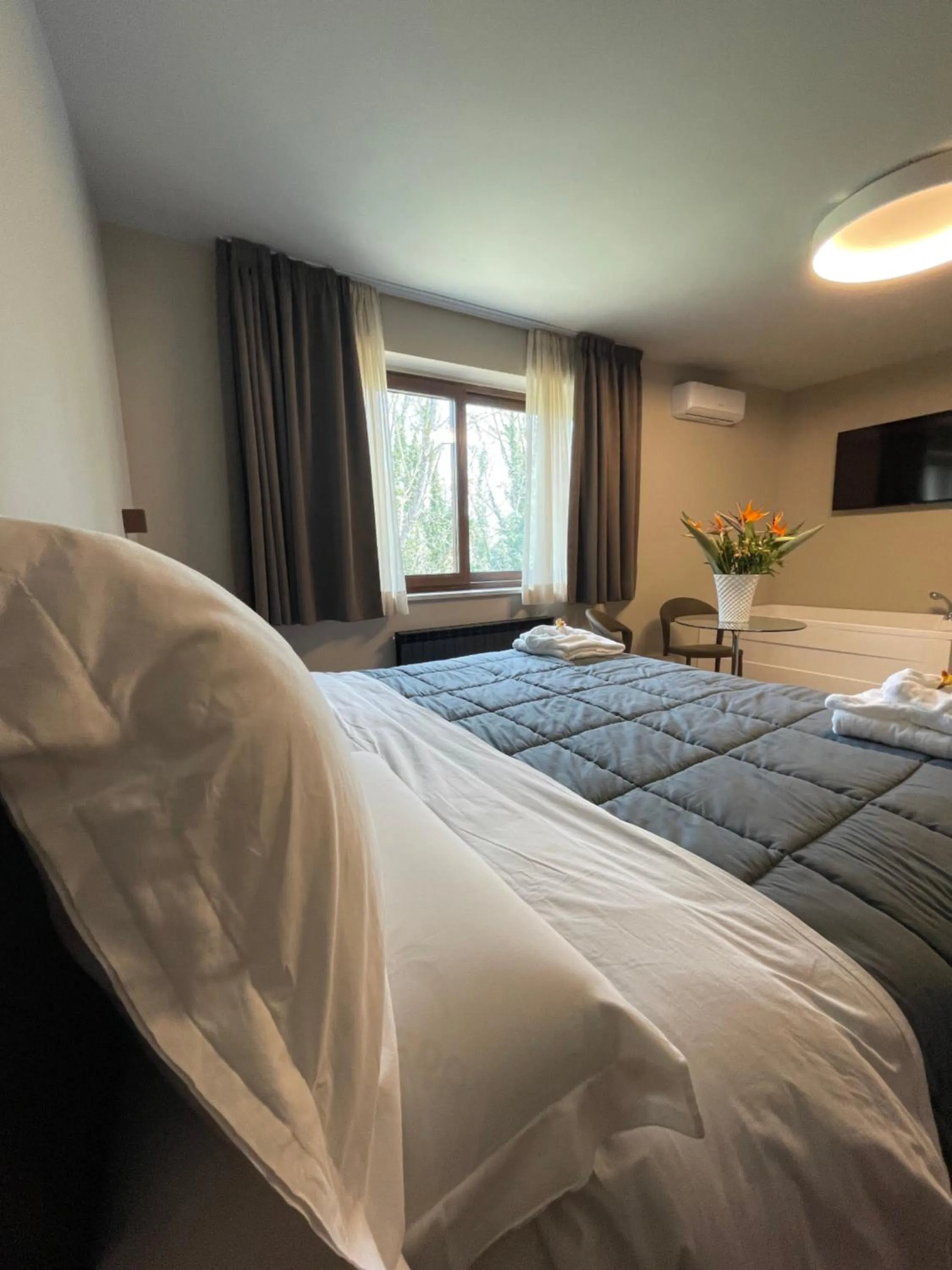 Bed in Aminta Resort