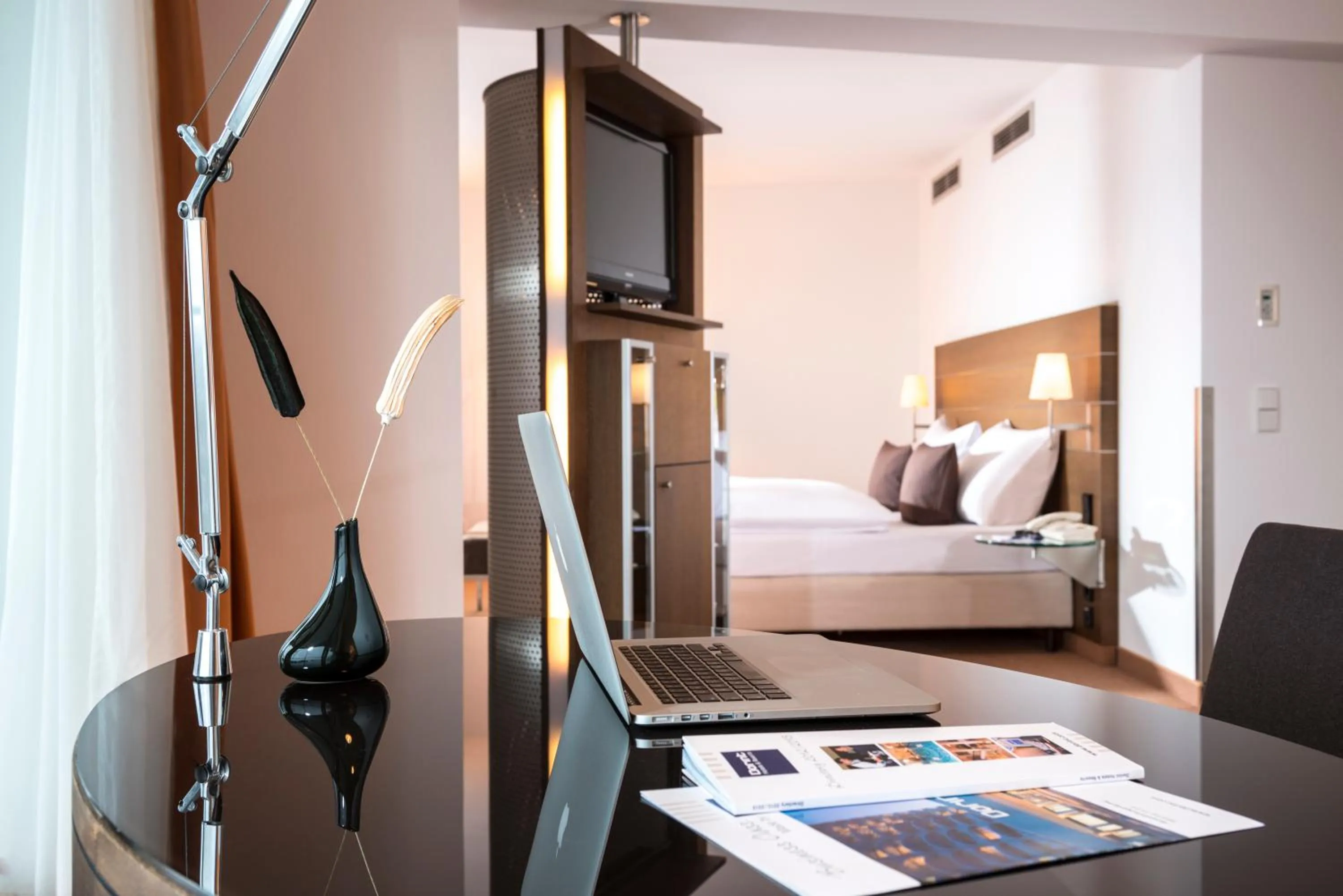 Photo of the whole room, Bed in Dorint An der Kongresshalle Augsburg