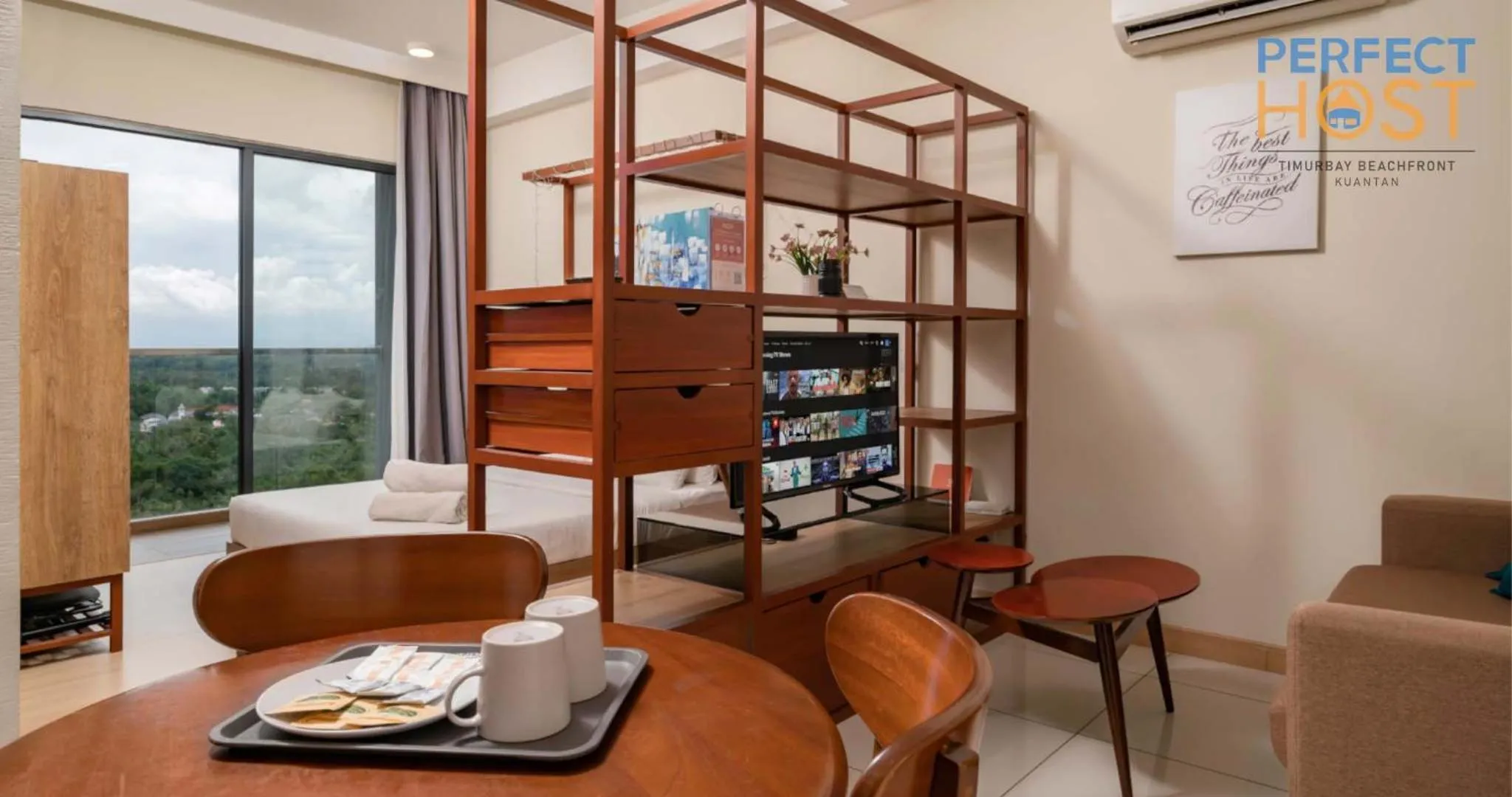 Living room in Timurbay Beachfront by Perfect Host