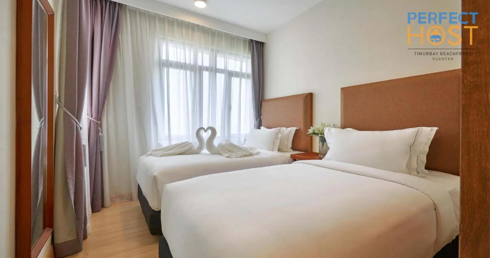 Bed in Timurbay Beachfront by Perfect Host