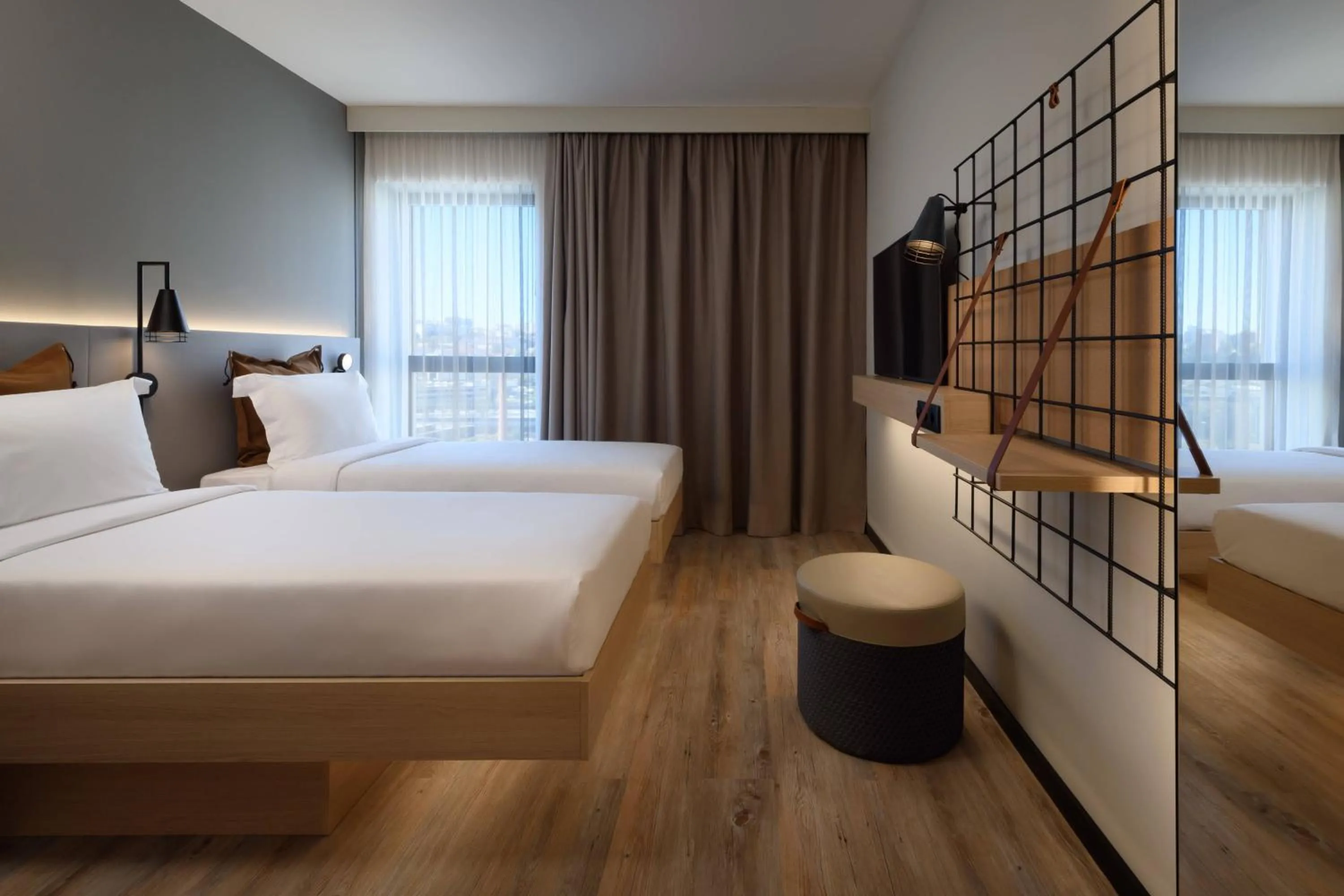 Photo of the whole room, Bed in Moxy Lisboa Oriente