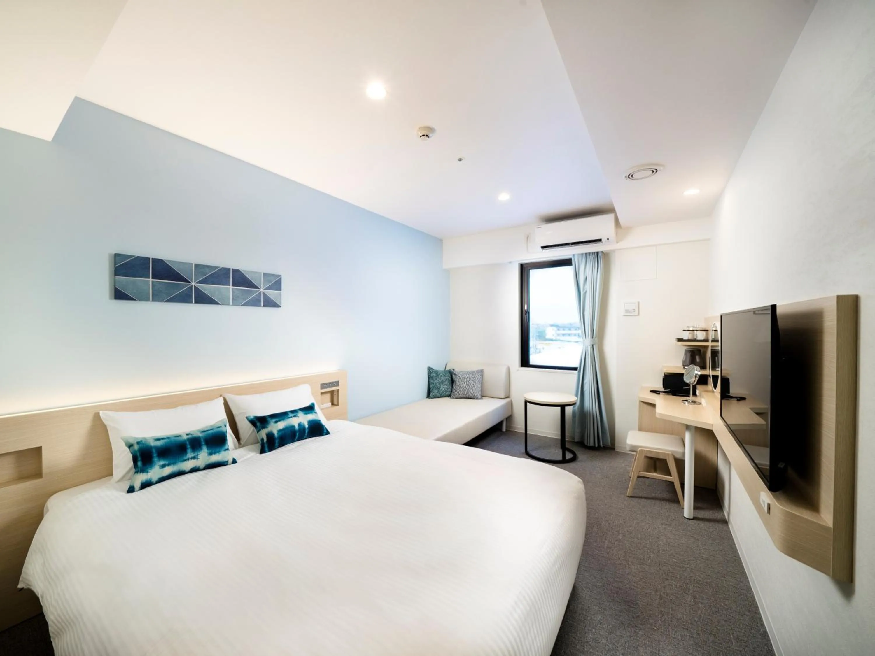 Photo of the whole room, Bed in Hotel Torifito Miyakojima Resort