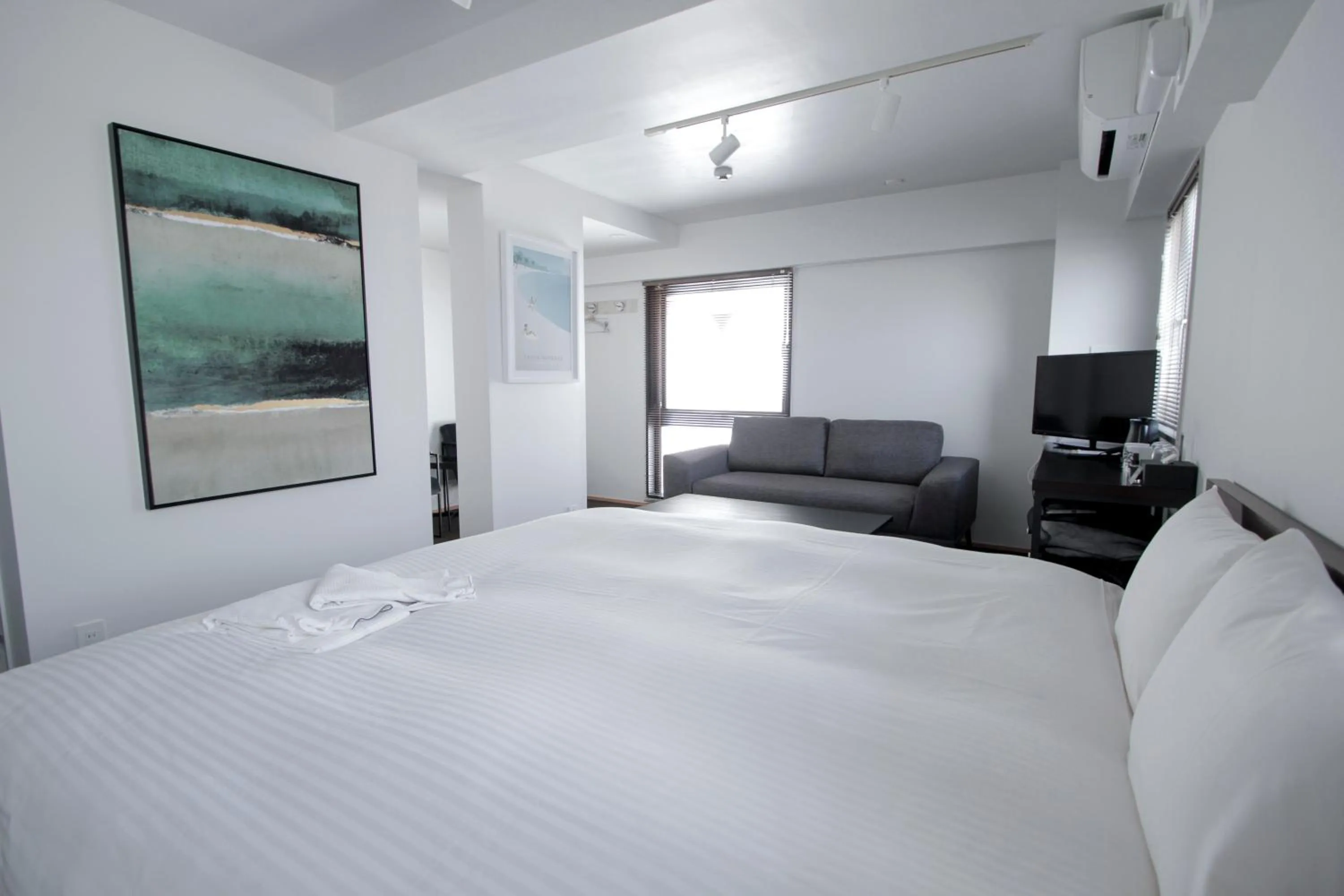 Bed in 8HOTEL Chigasaki