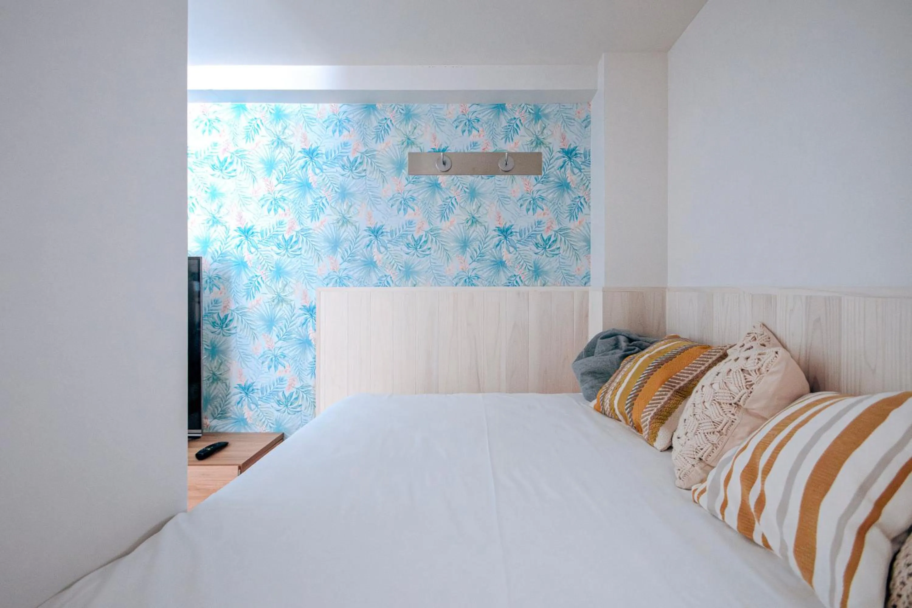 Bed in 8HOTEL Chigasaki