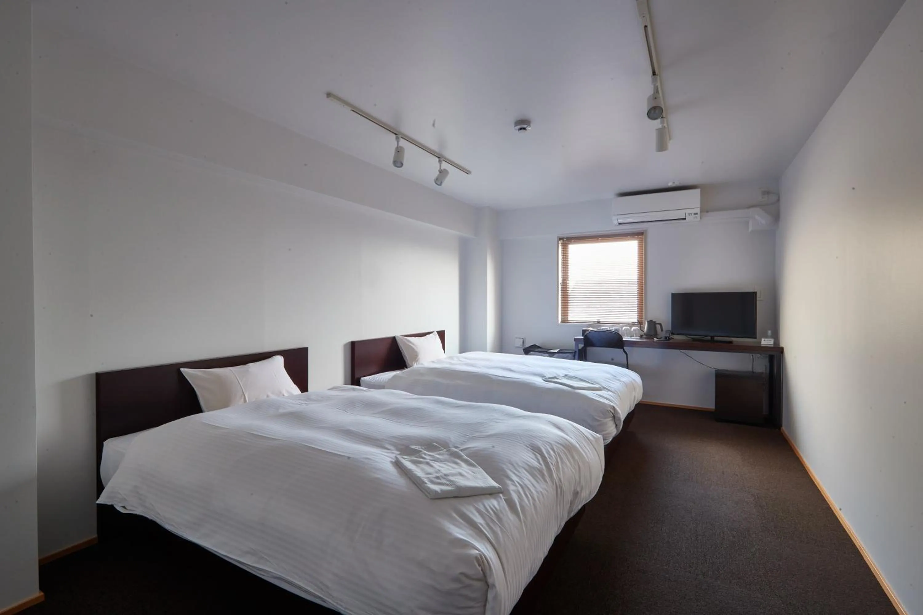 Bed in 8HOTEL Chigasaki