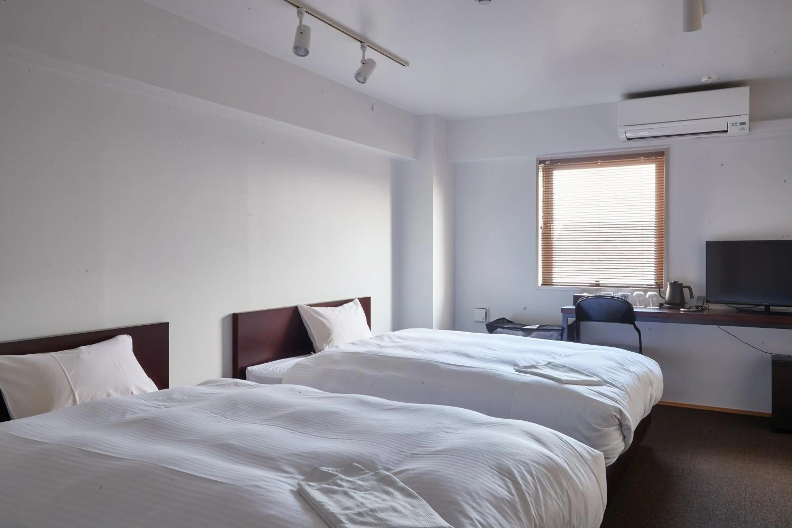 Bed in 8HOTEL Chigasaki