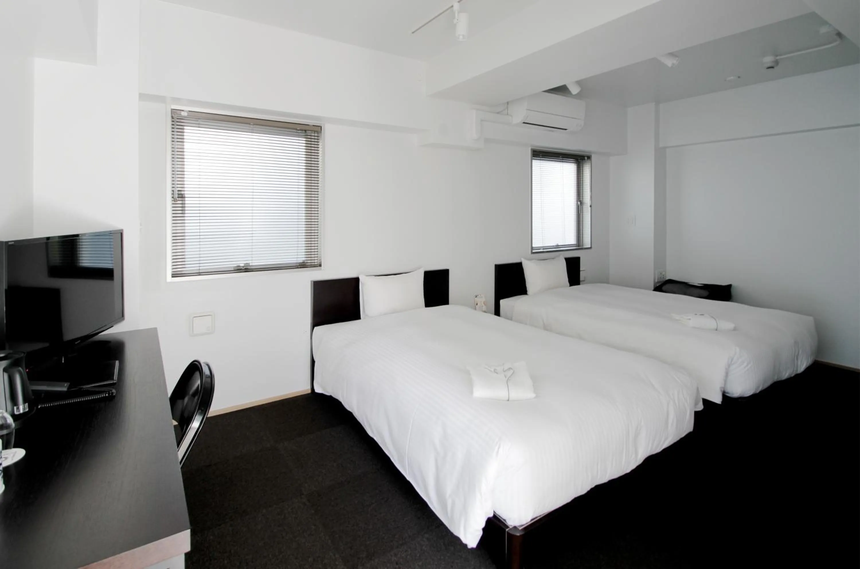 Bed in 8HOTEL Chigasaki