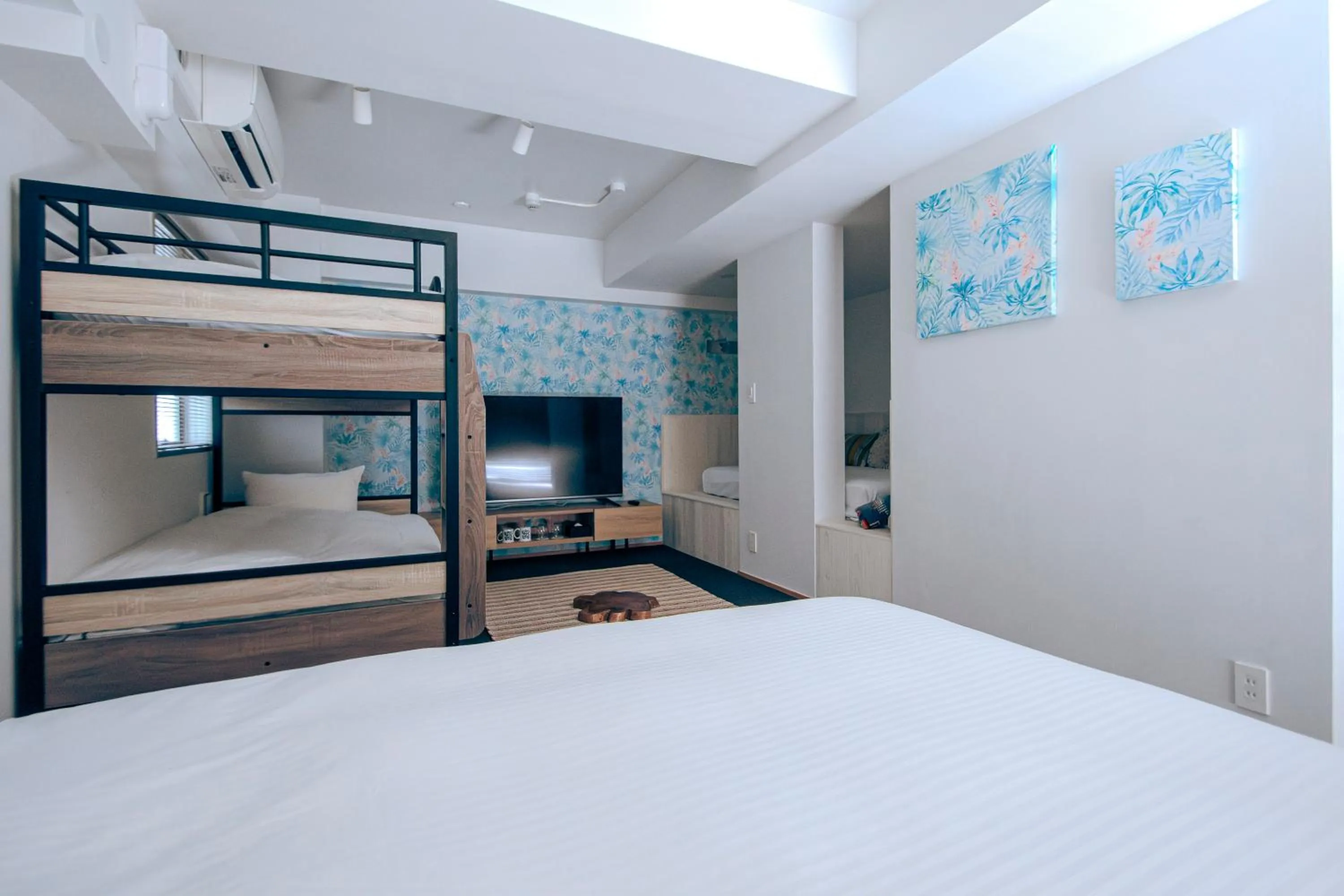 Bed in 8HOTEL Chigasaki