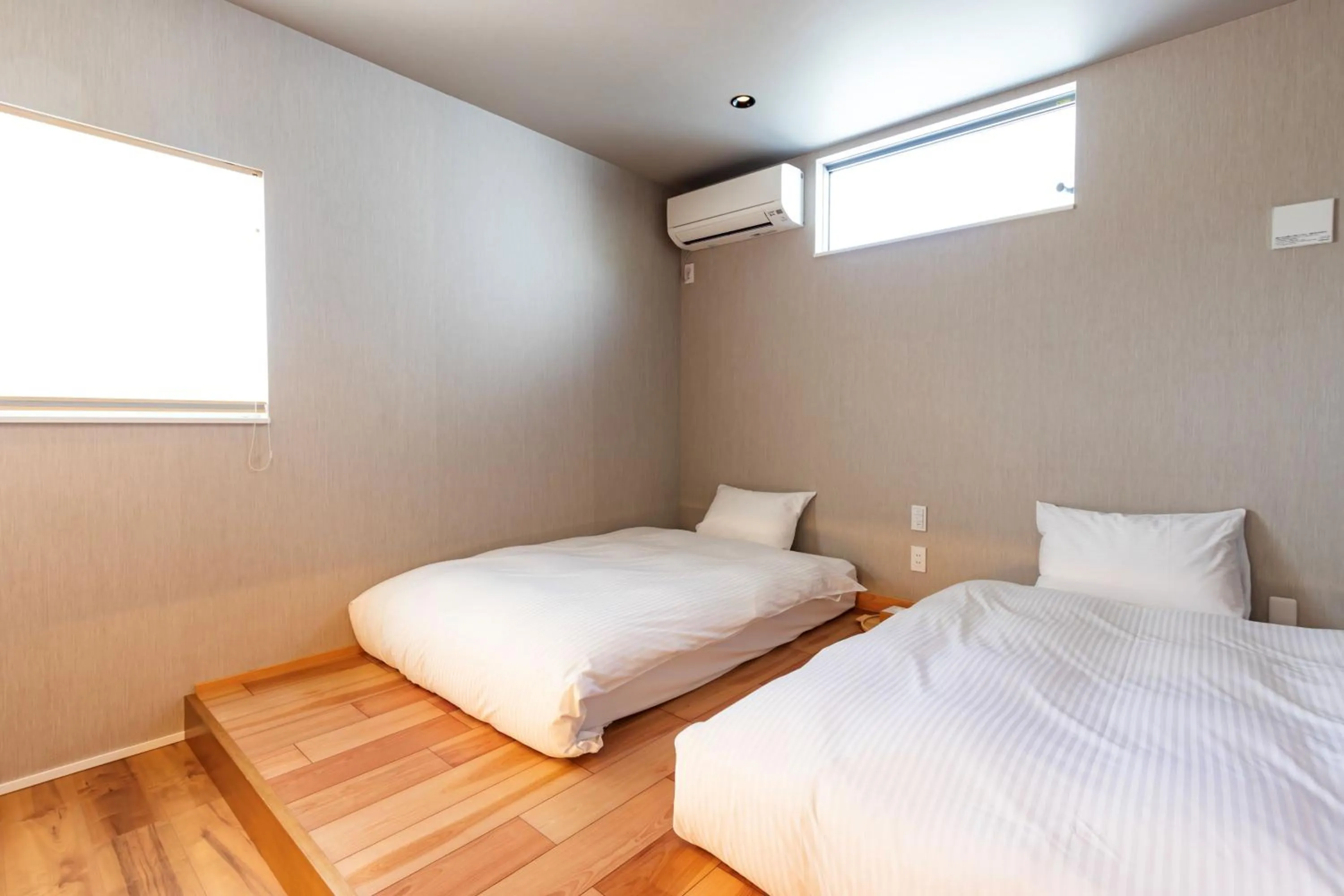 Bed in KAMOME SLOW HOTEL