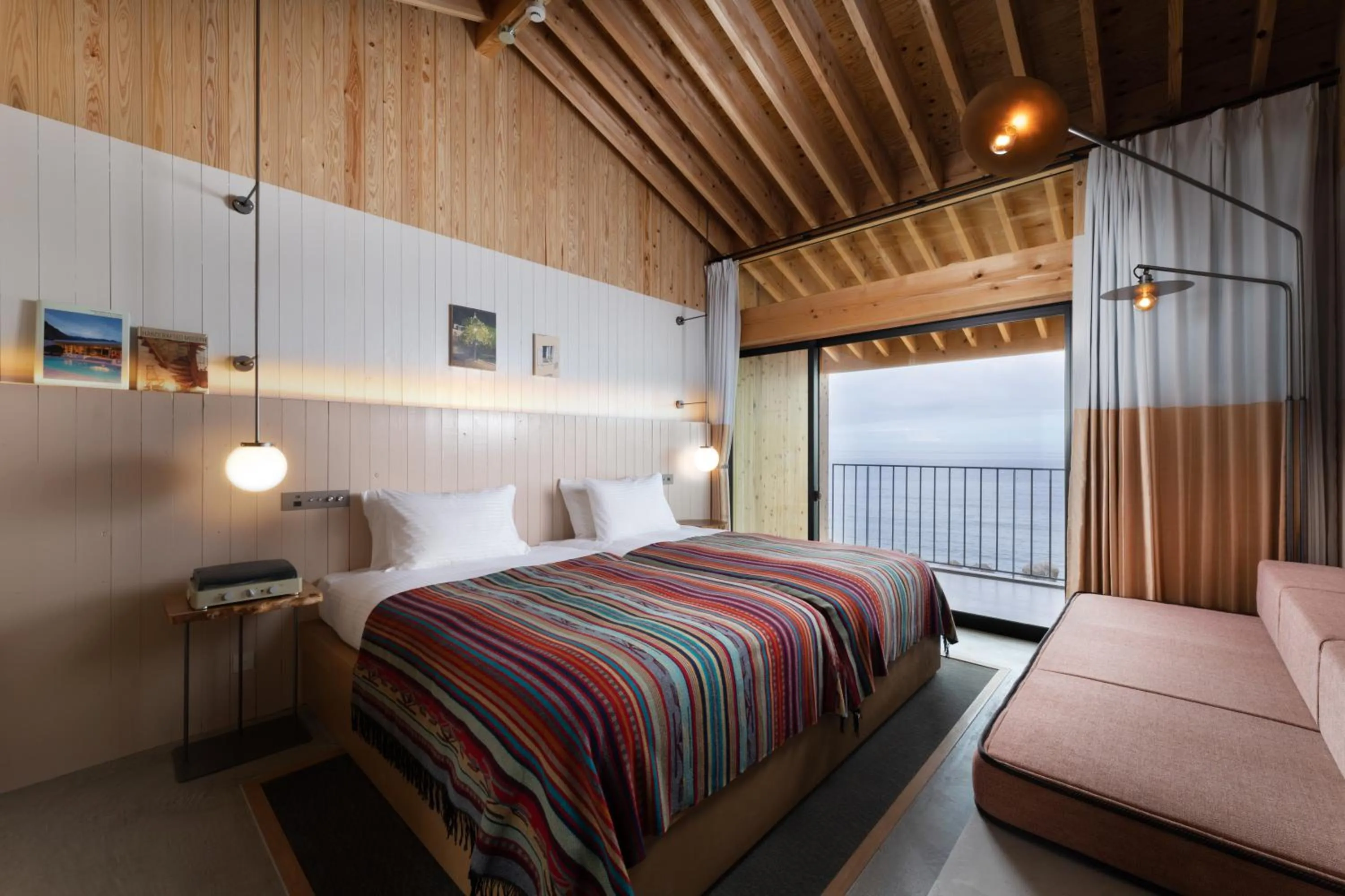 Bed in KAMOME SLOW HOTEL