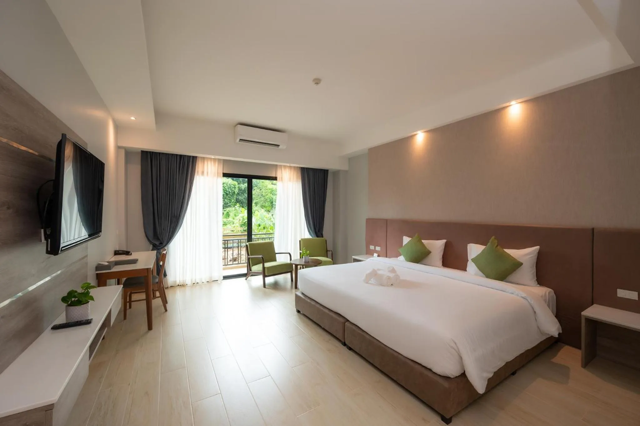 Photo of the whole room, Bed in Phumontra Resort Nakhon Nayok