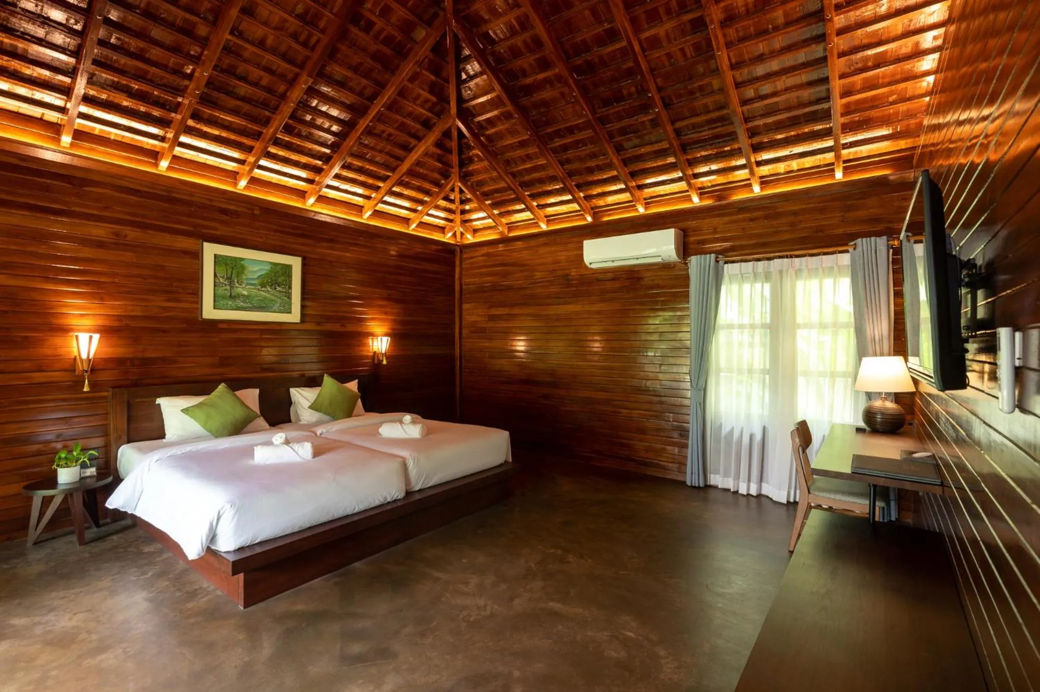 Photo of the whole room, Bed in Phumontra Resort Nakhon Nayok