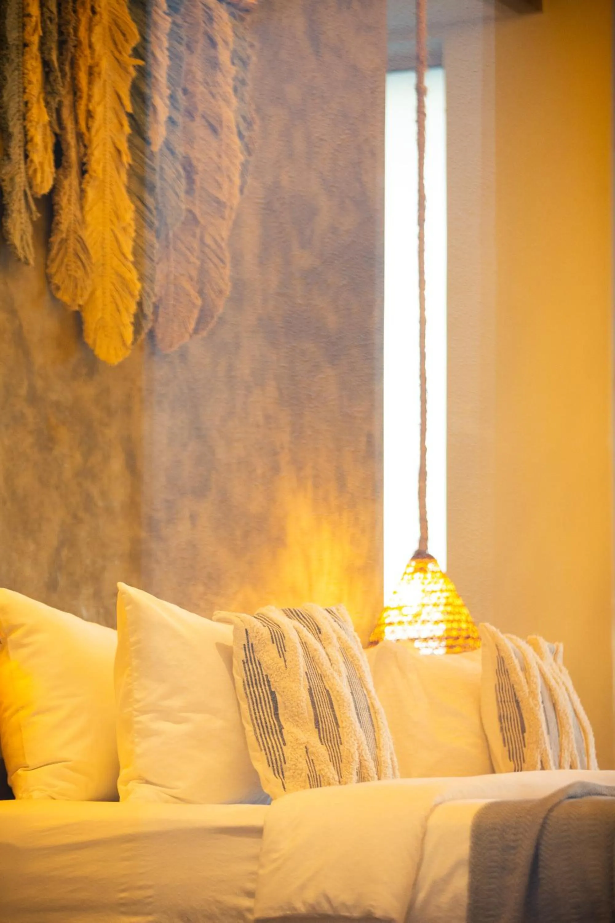 Bed in ANGKLA Beach Club & Boutique Resort