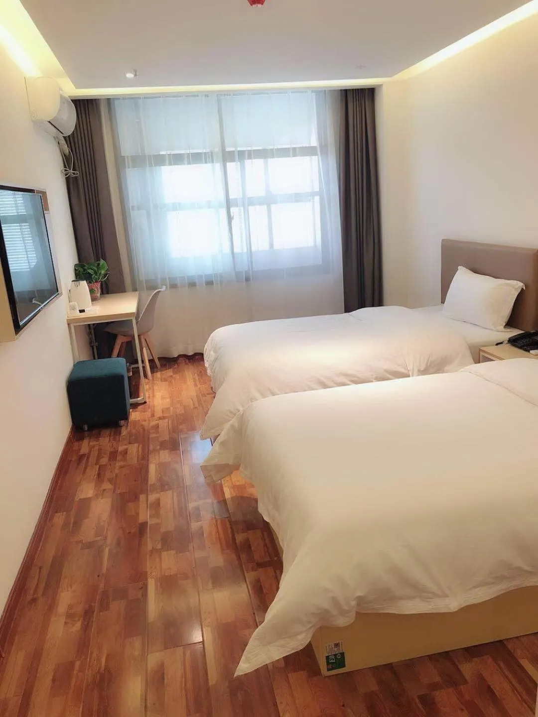 Bed in 7Days Inn Xianyang Xingping Jincheng Road Branch