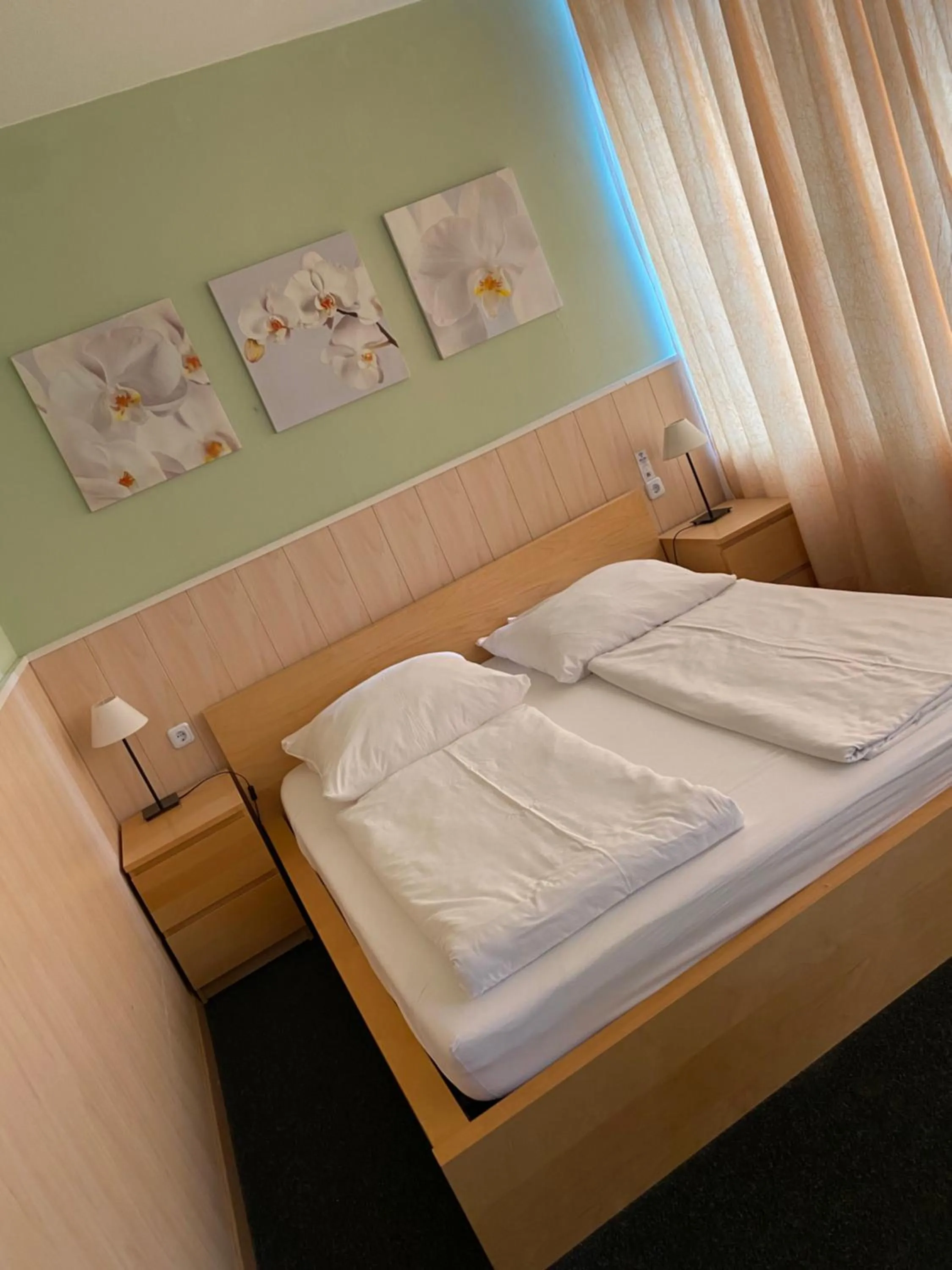 Bed in Hotel Schwarzer Bär