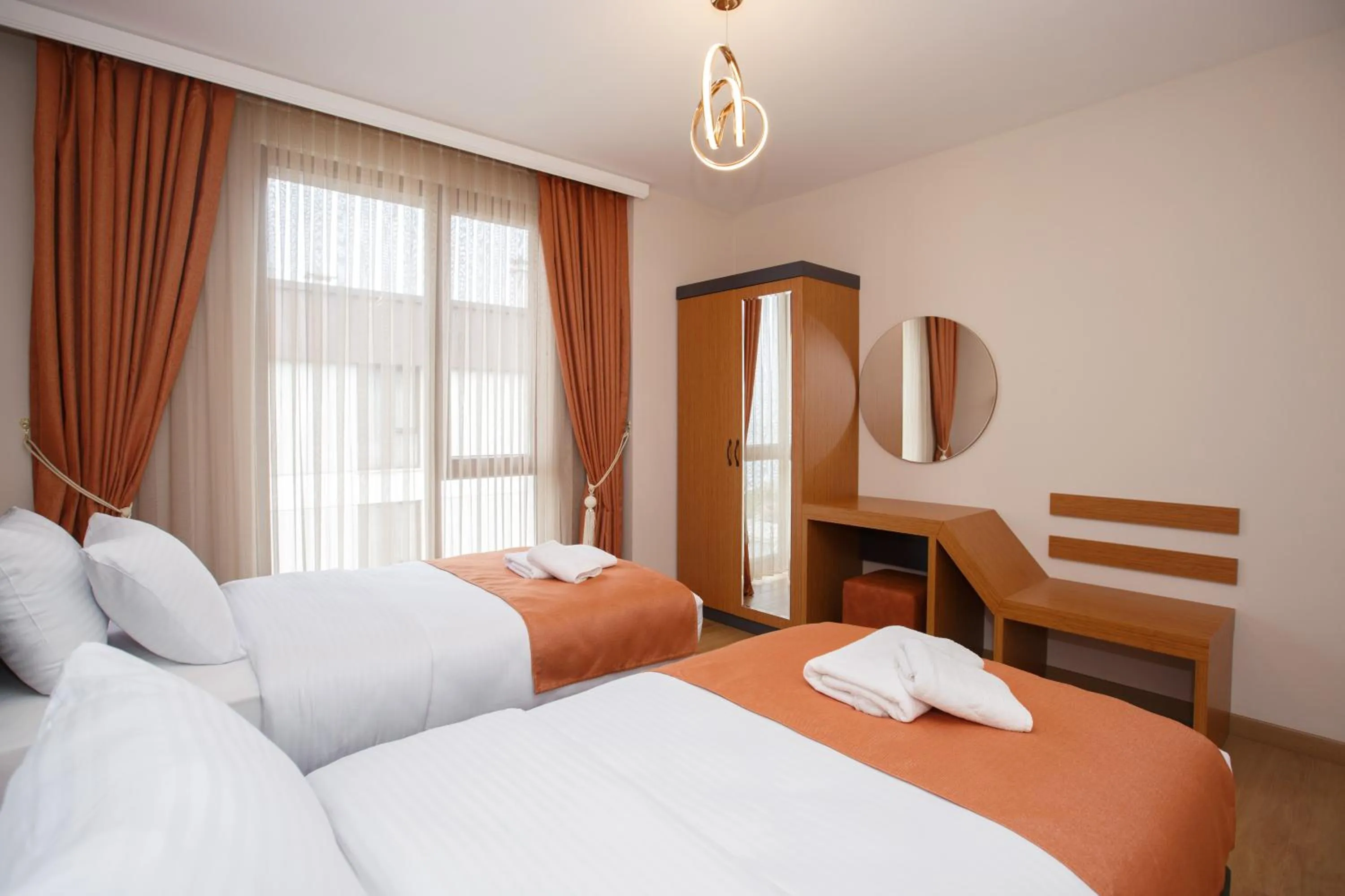 Bed in Armoni Deluxe Suites Trabzon