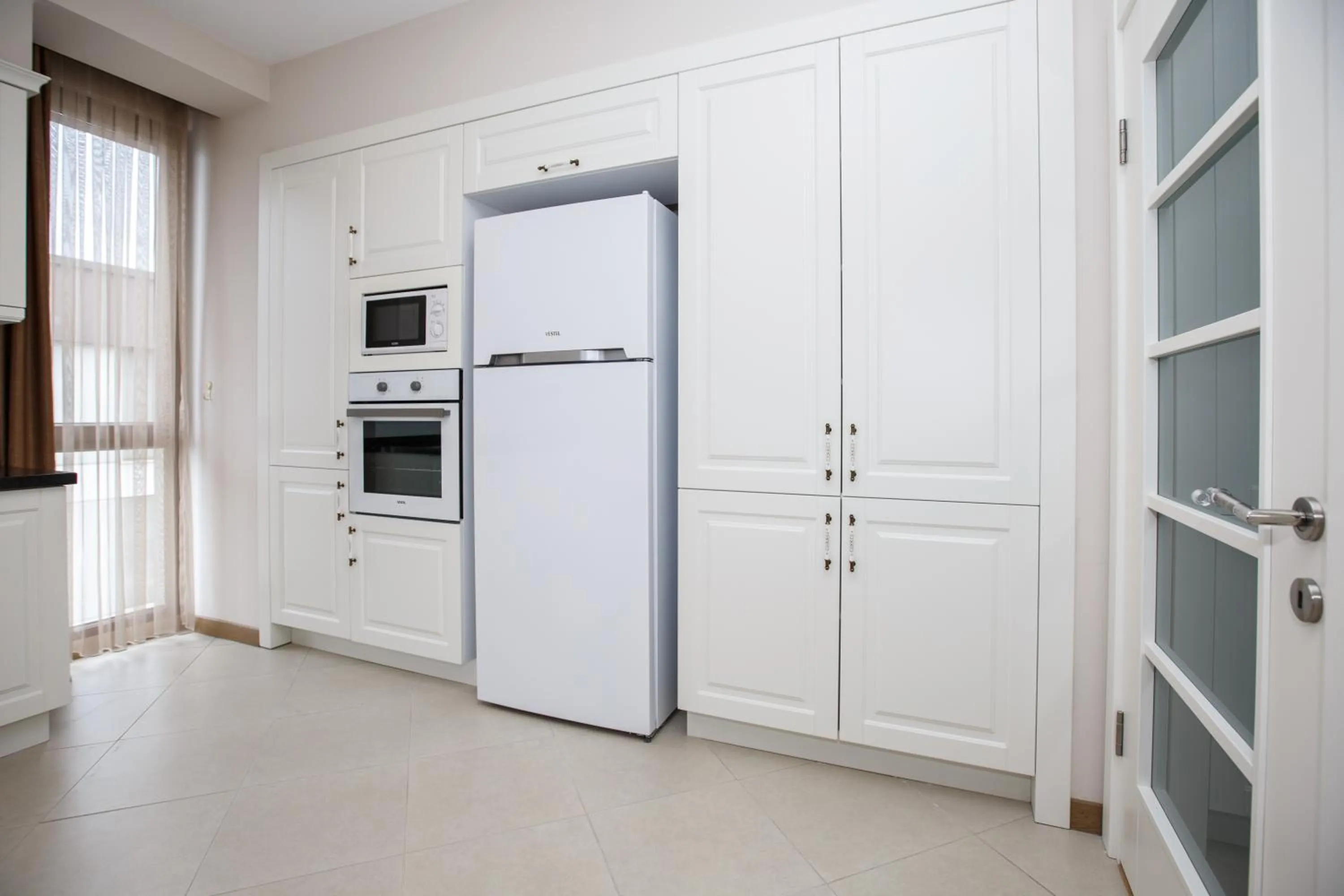 Kitchen or kitchenette in Armoni Deluxe Suites Trabzon