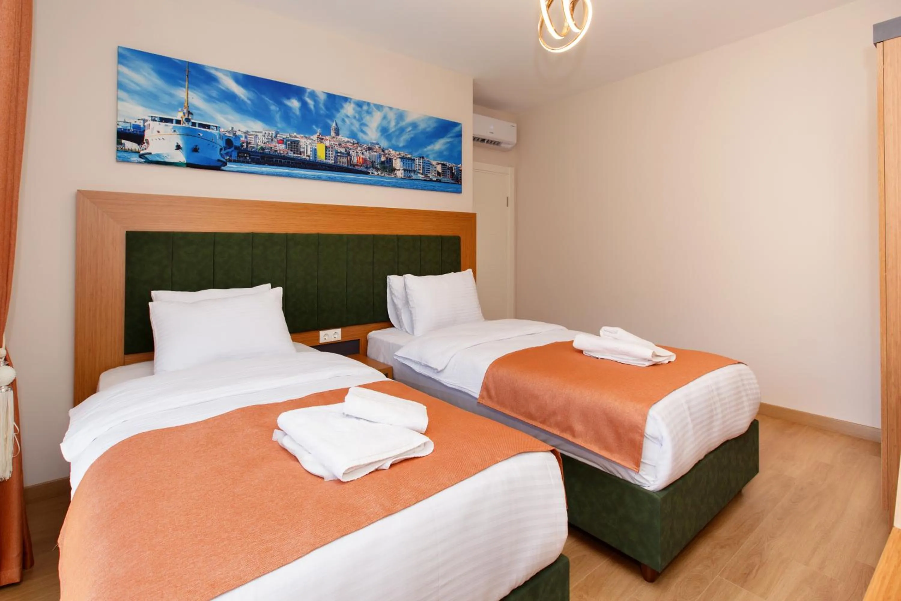 Bed in Armoni Deluxe Suites Trabzon