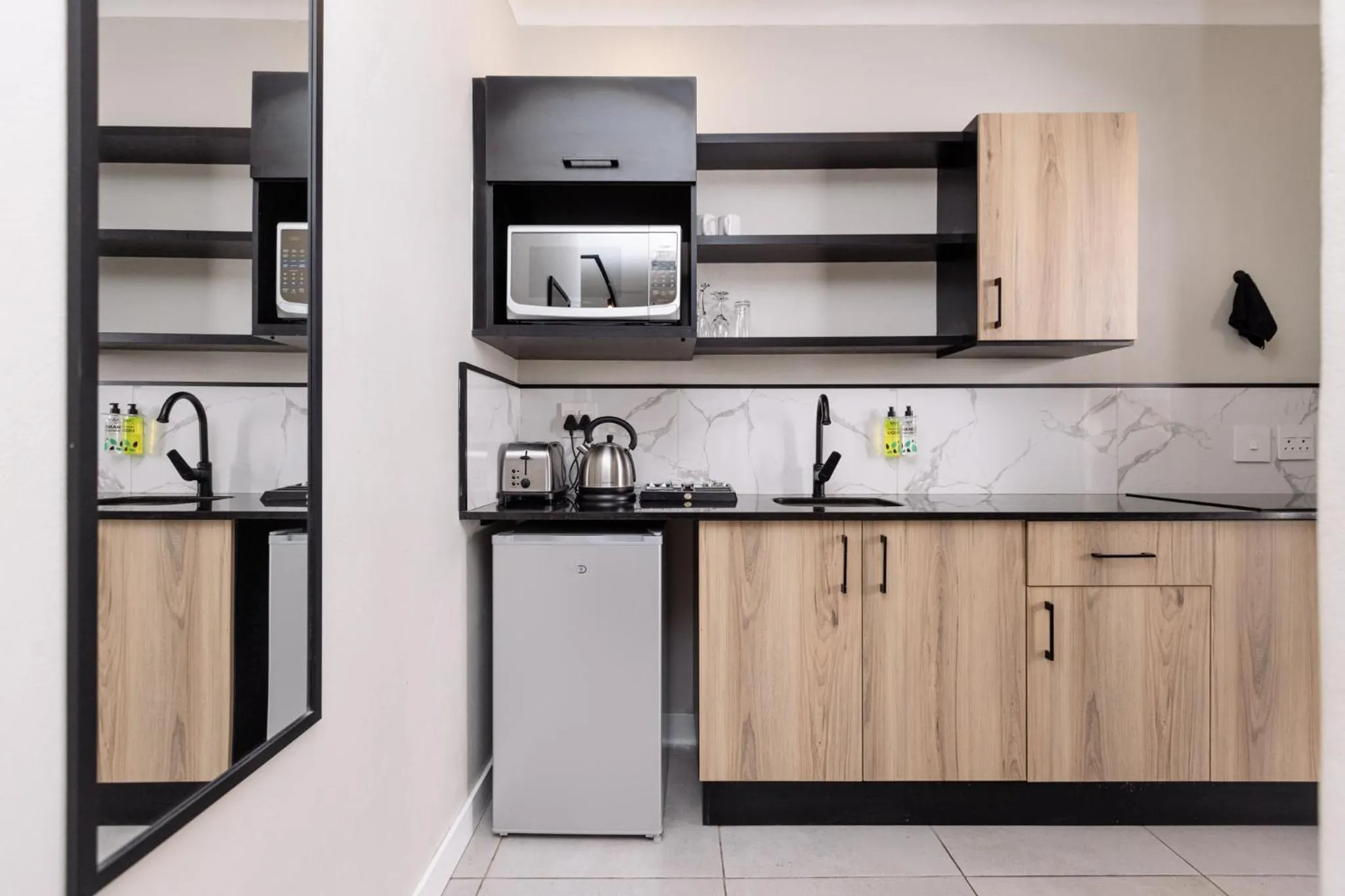 Kitchen or kitchenette in MINT Hotel 84 on Katherine