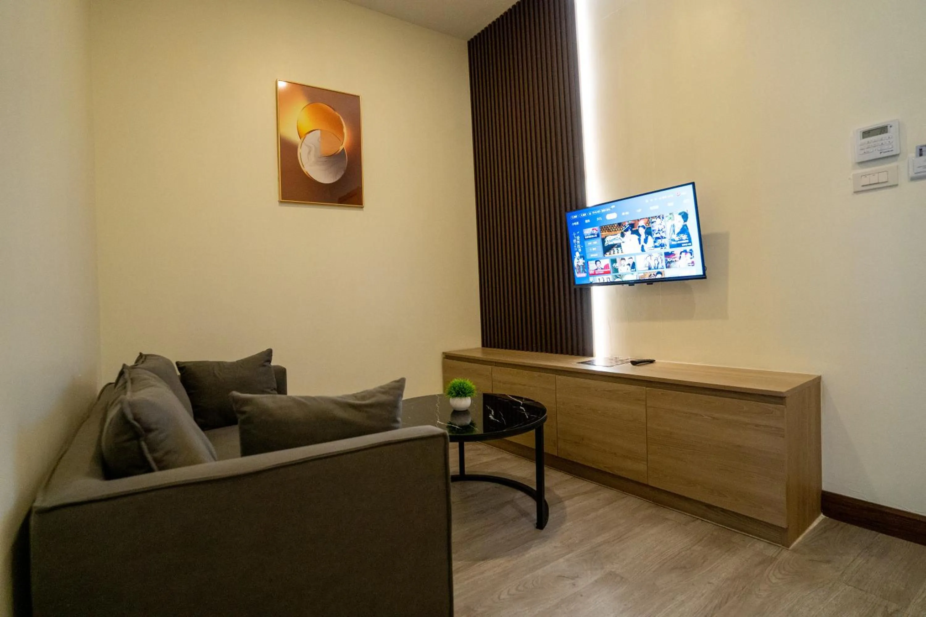 Communal lounge/ TV room in Hak Heng Hotel