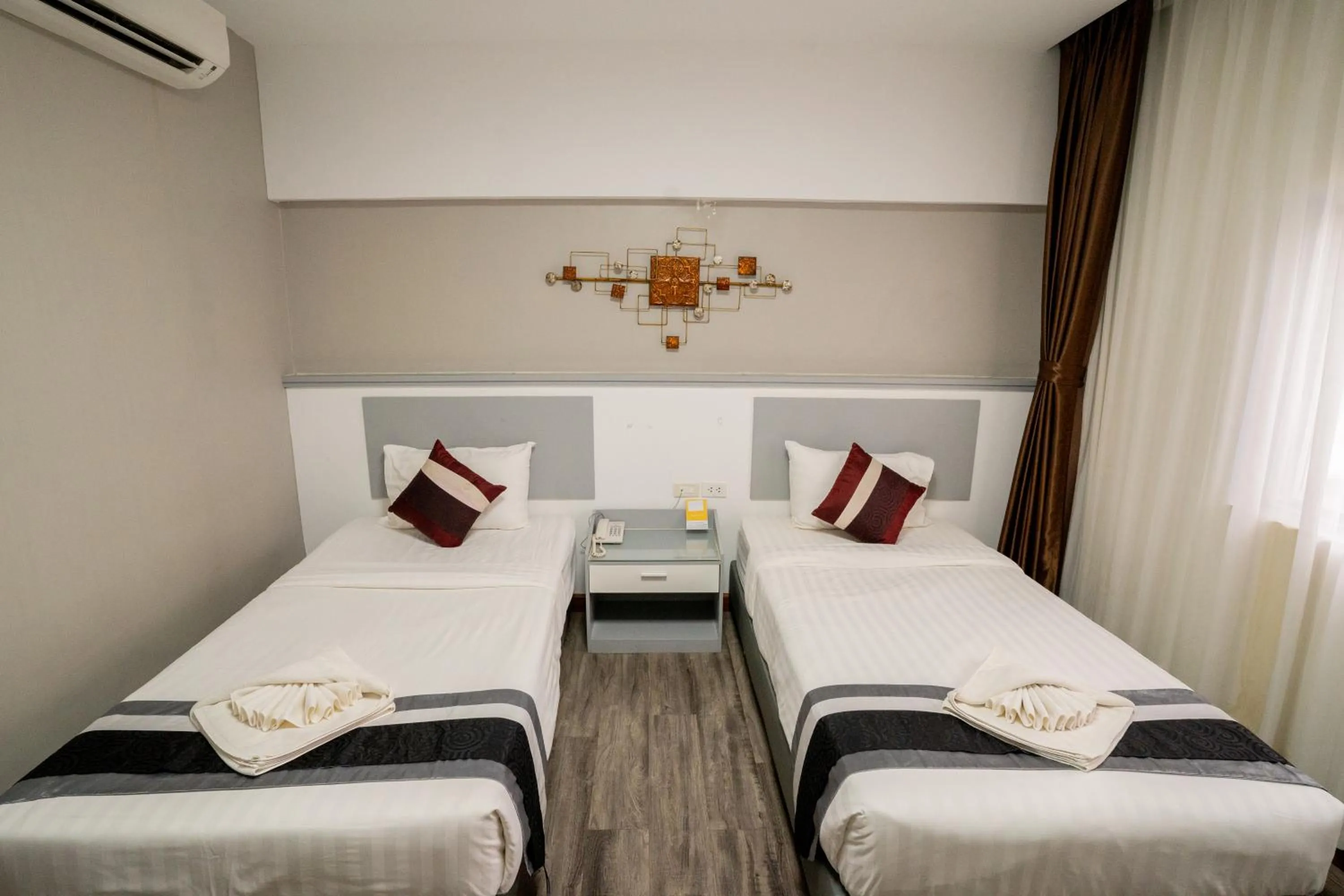 Bed in Hak Heng Hotel