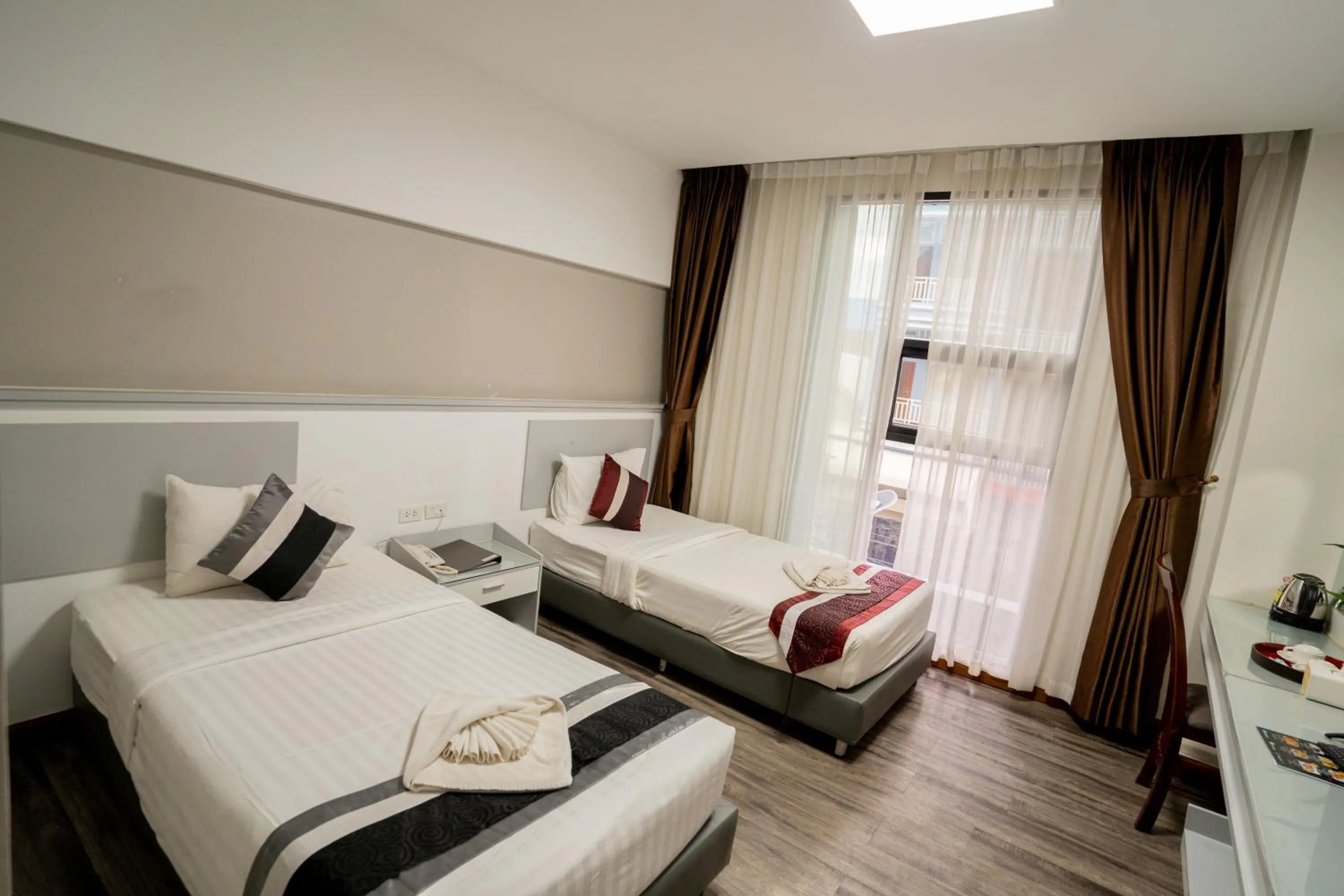 Bed in Hak Heng Hotel